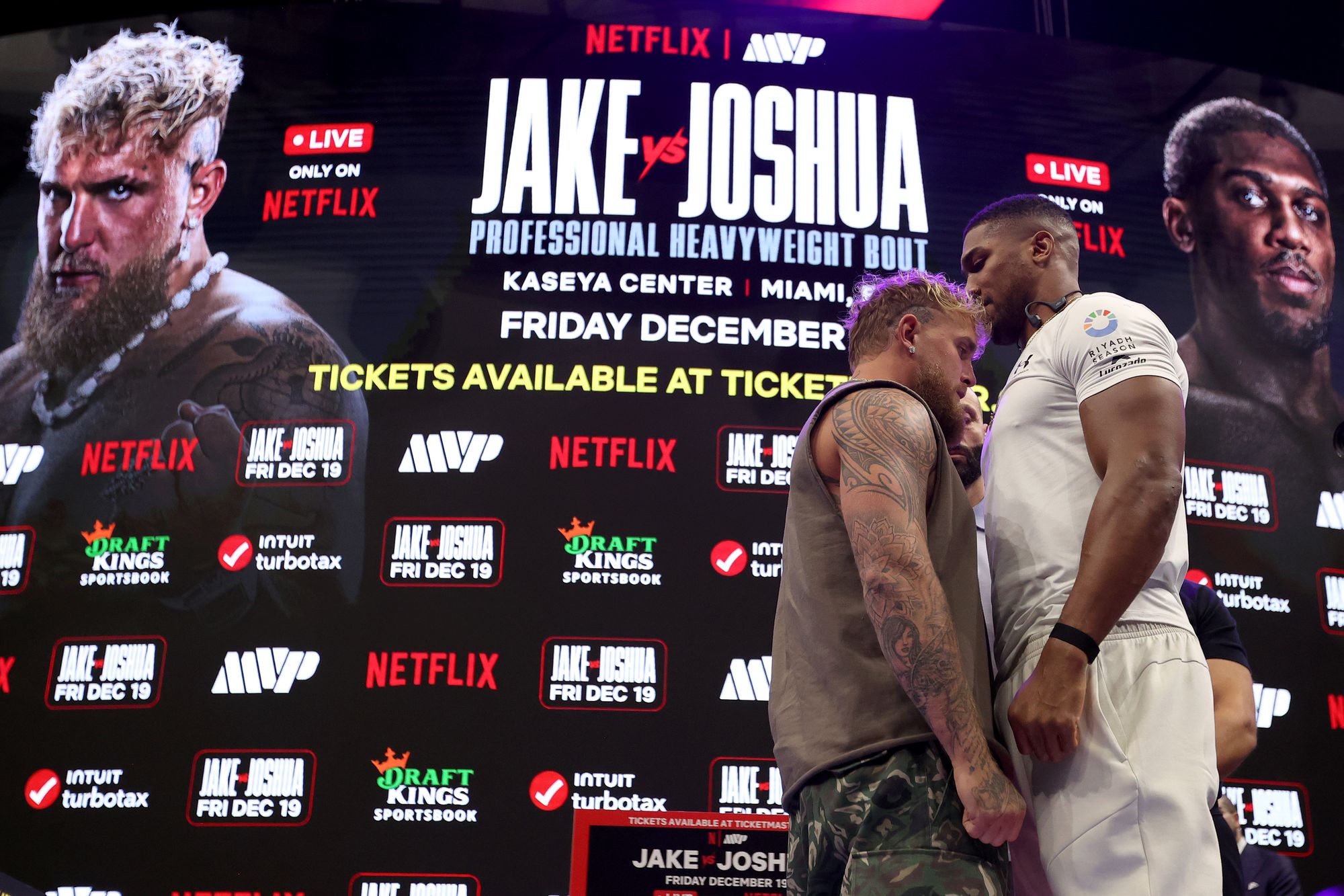 Anthony Joshua towered over Jake Paul at their face-off last month