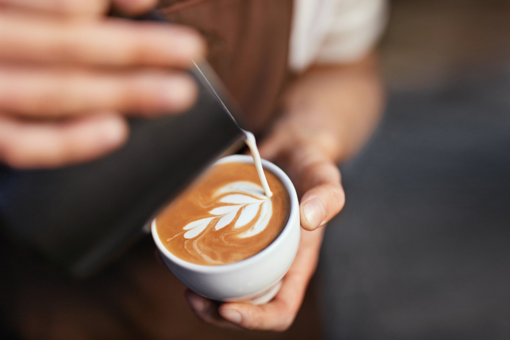 A flat white isn’t just about the beans. Rising dairy prices mean the cost of milk, energy and labour is now baked into every cup