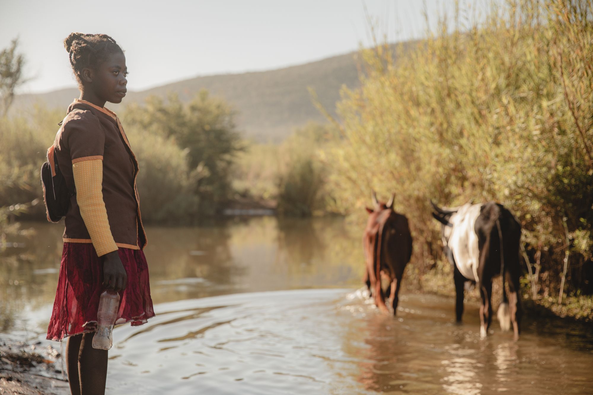 Nestelline, 13, collects water from the Taranty Bas river in the drought-stricken south of Madagascar