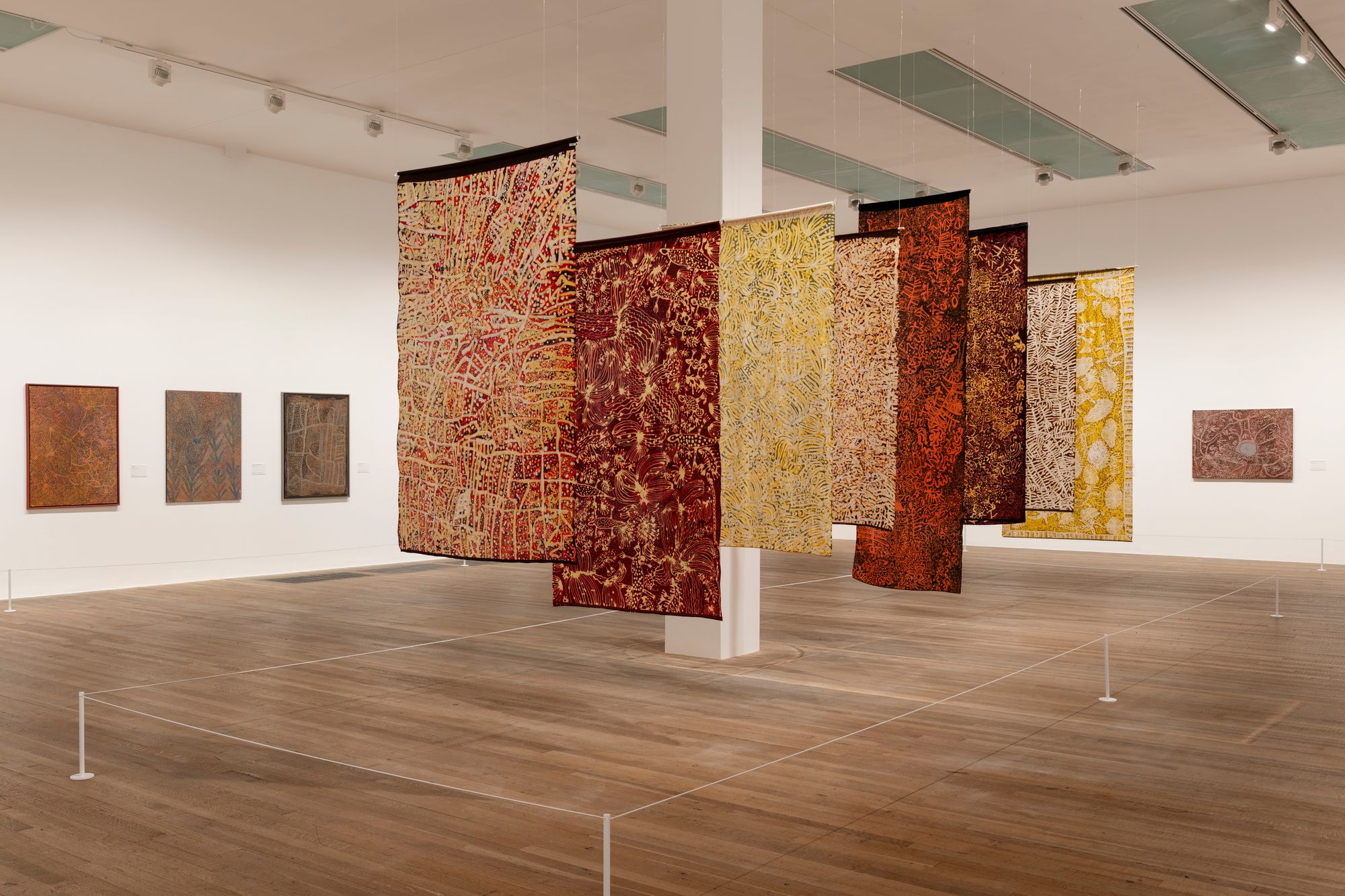 An installation view of Emily Kam Kngwarray's artworks at the Tate Modern