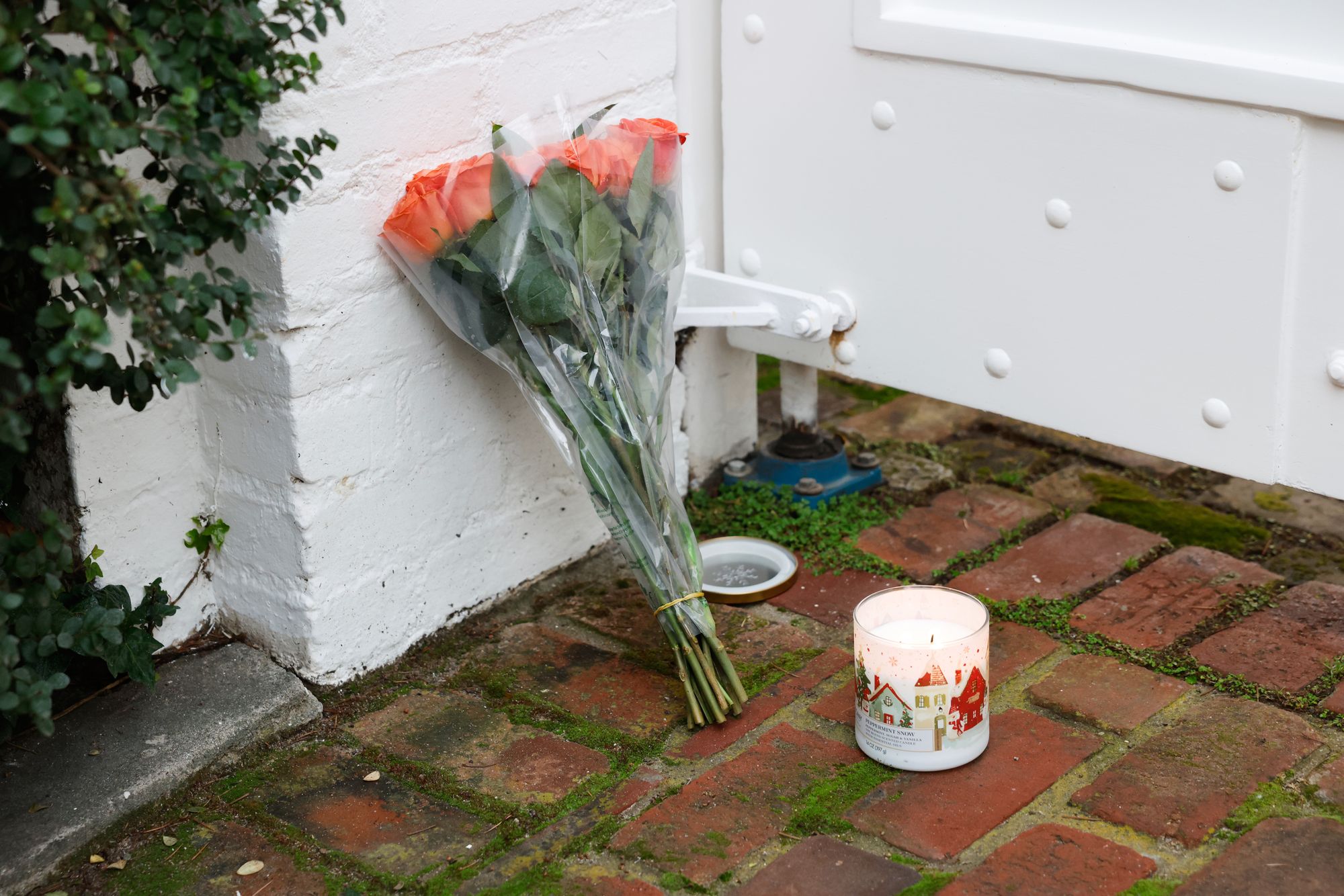 Flowers are placed outside Rob Reiner’s home on Monday