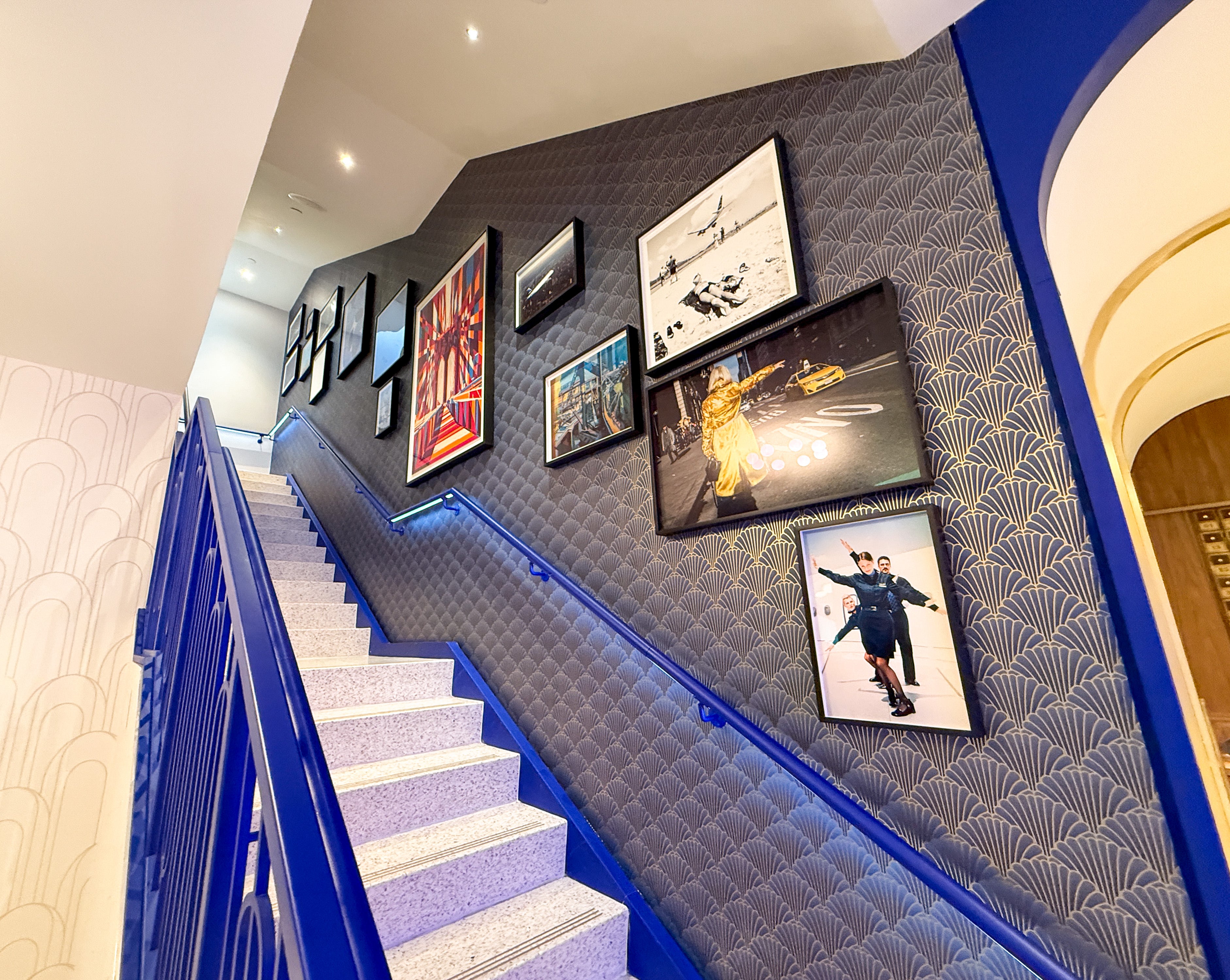 Pictured is the entry gallery wall at BlueHouse inside the JetBlue lounge.