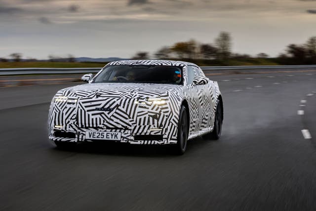 <p>The new all-electric Jaguar GT is set to lose its camouflage next summer</p>