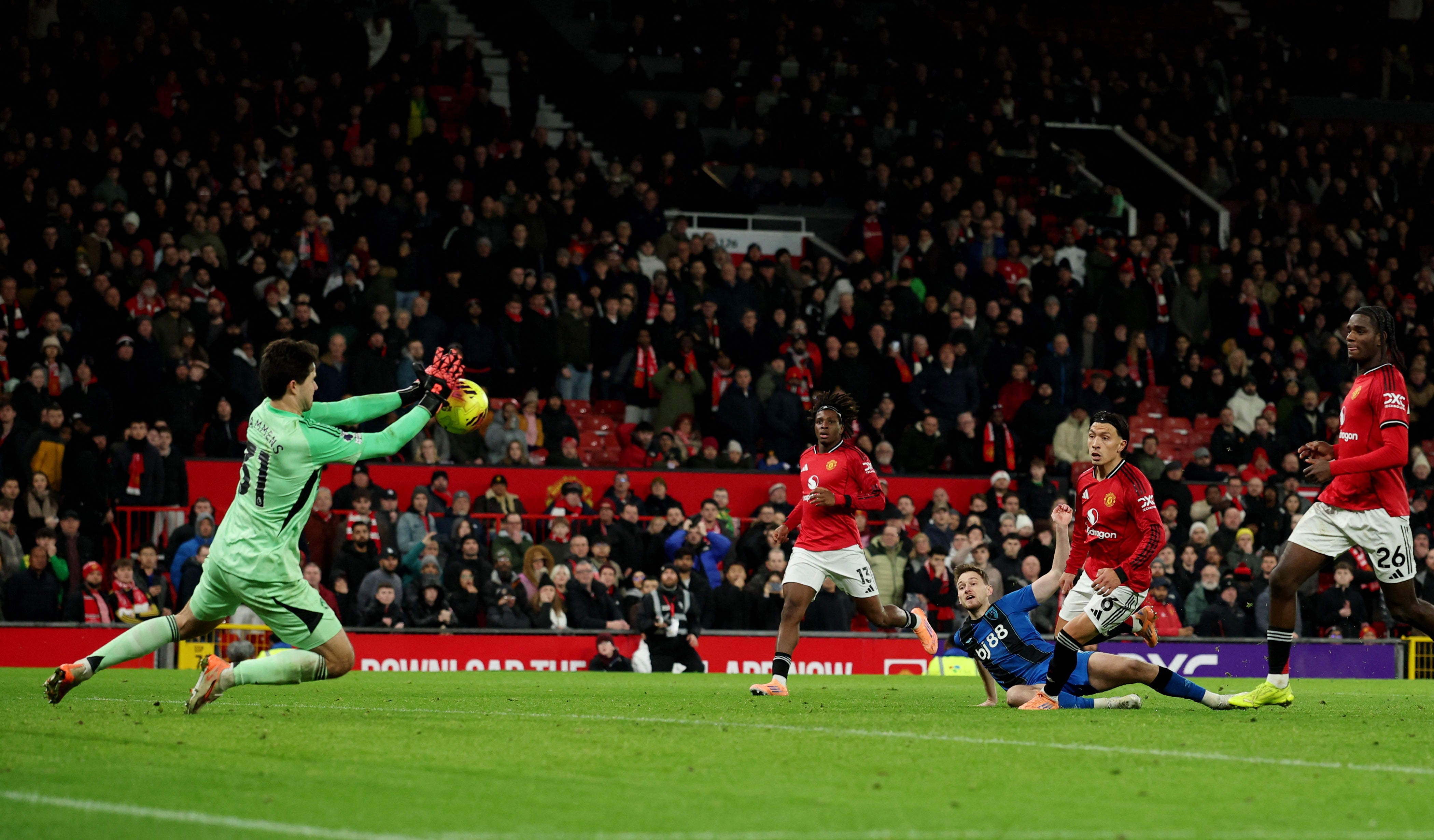 Two late saves from Senne Lammens prevented Bournemouth winning a classic match