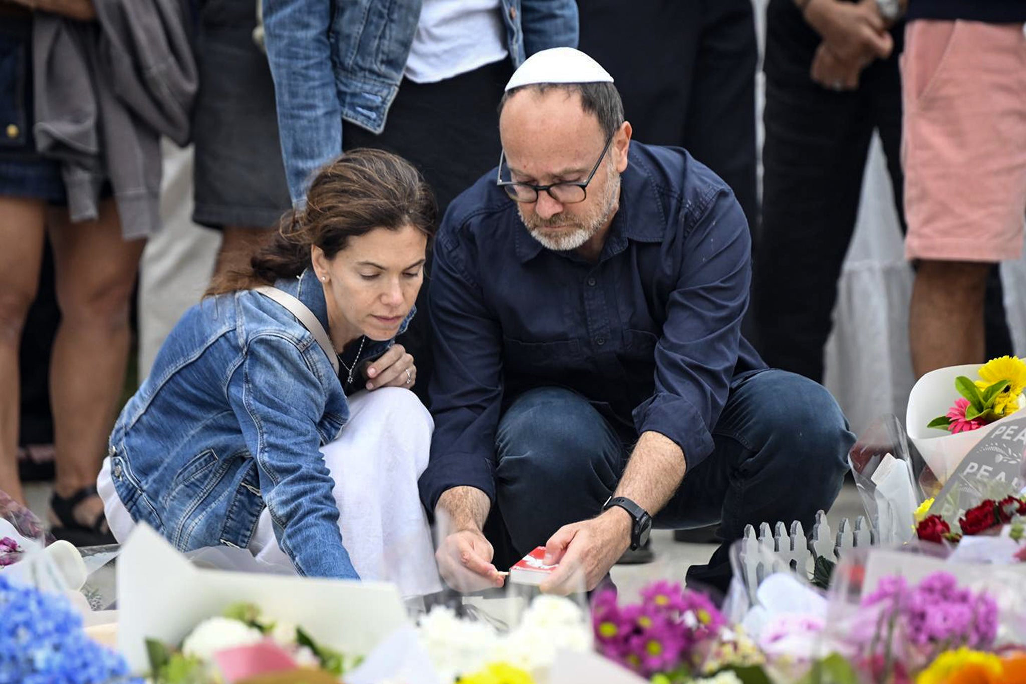 Mourners gather to pay tribute to victims of the Bondi Beach shooting