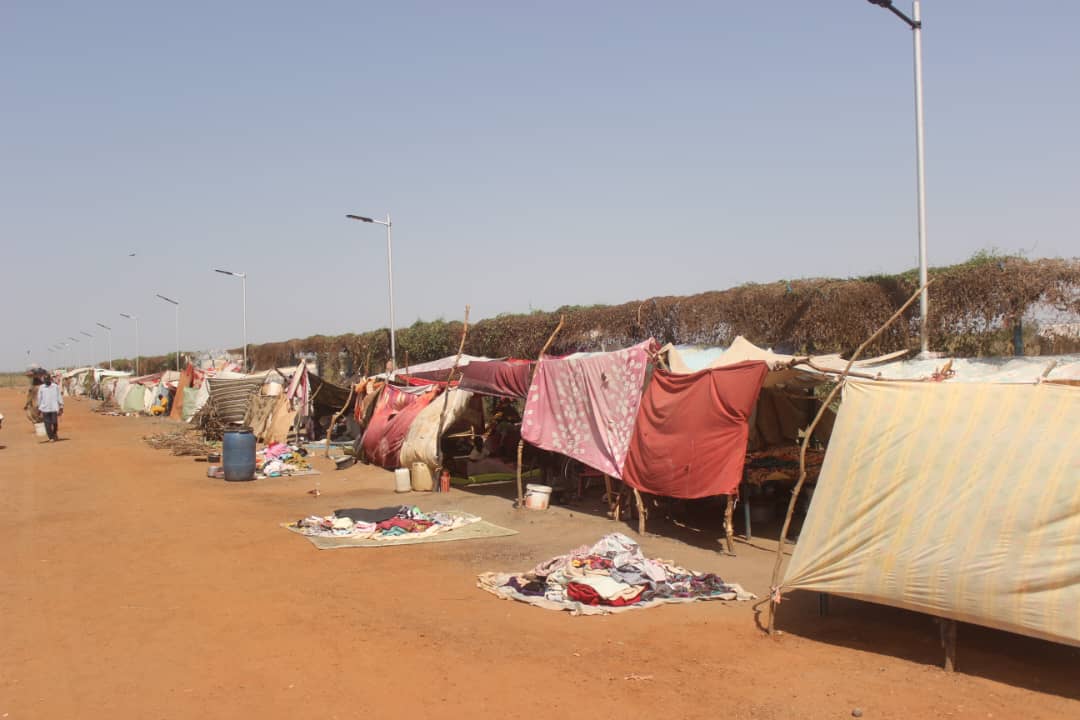 People in the Renk transit centre put clothes on display for sale in order to get money for food and other essential needs