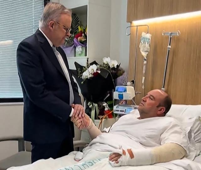 <p>This frame grab from a video posted on the X (formerly Twitter) account of @AlboMP of  Australia's prime minister Anthony Albanese taken and released on 16 December 2025 shows Albanese (L) meeting Ahmed al Ahmed, the man who disarmed one of the attackers during the Bondi Beach attack, in hospital in Sydney</p>