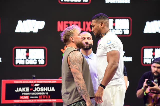Jake Paul and Anthony Joshua during a press conference (JC Ruiz/PA)