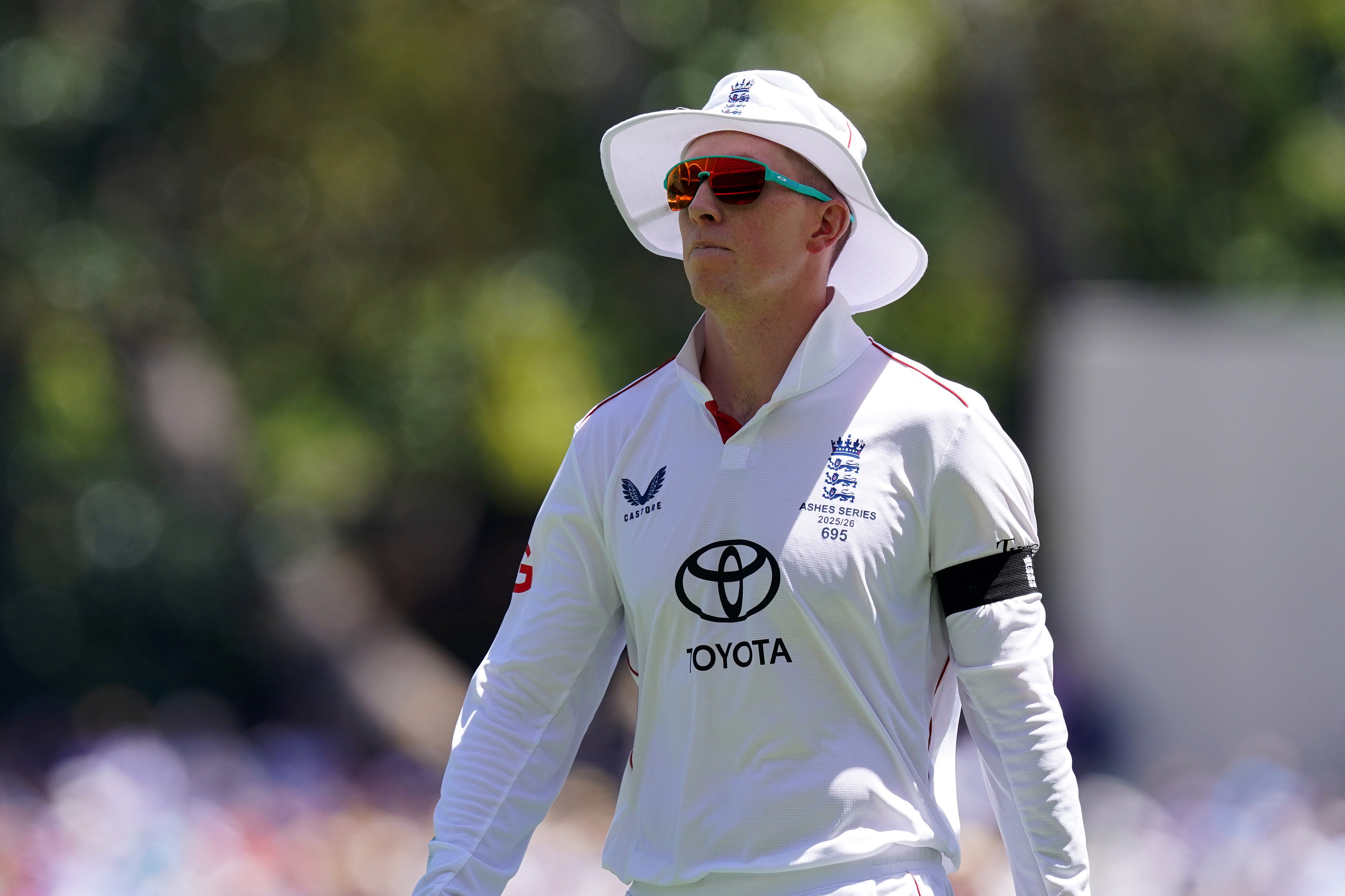 Players are wearing black armbands for the Test and flags were at half-mast