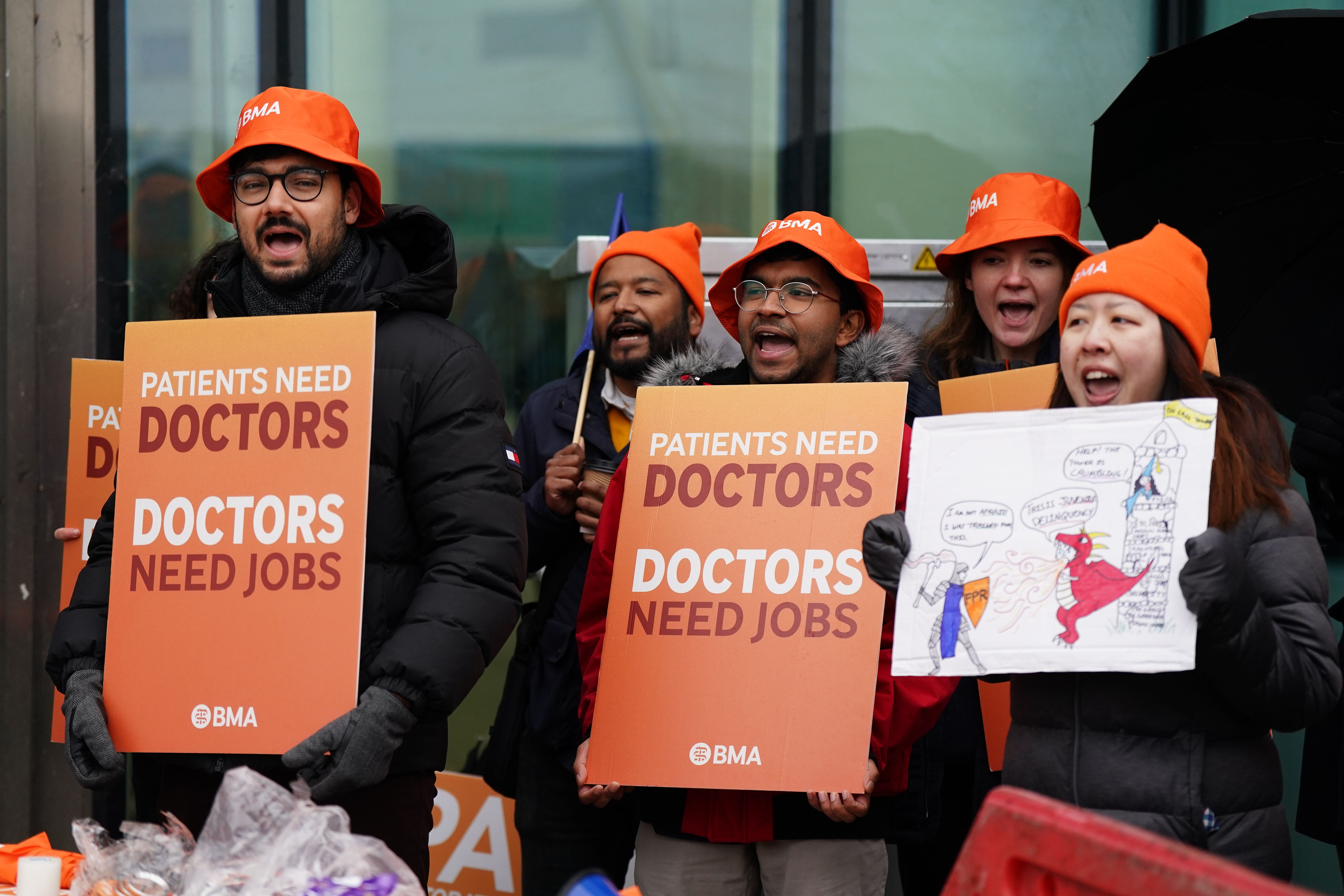 Resident doctors on the picket line outside Queen Elizabeth Hospital in Birmingham as they began strike action (Jacob King/PA)