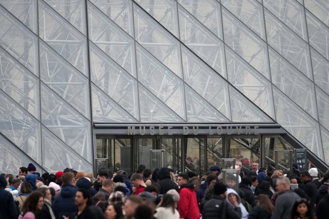 <p>People wait at the entrance of the Louvre museum as employees were set to vote on whether to extend a strike that shut the world's most visited museum, as unions protest chronic understaffing, building deterioration and recent management decisions</p>