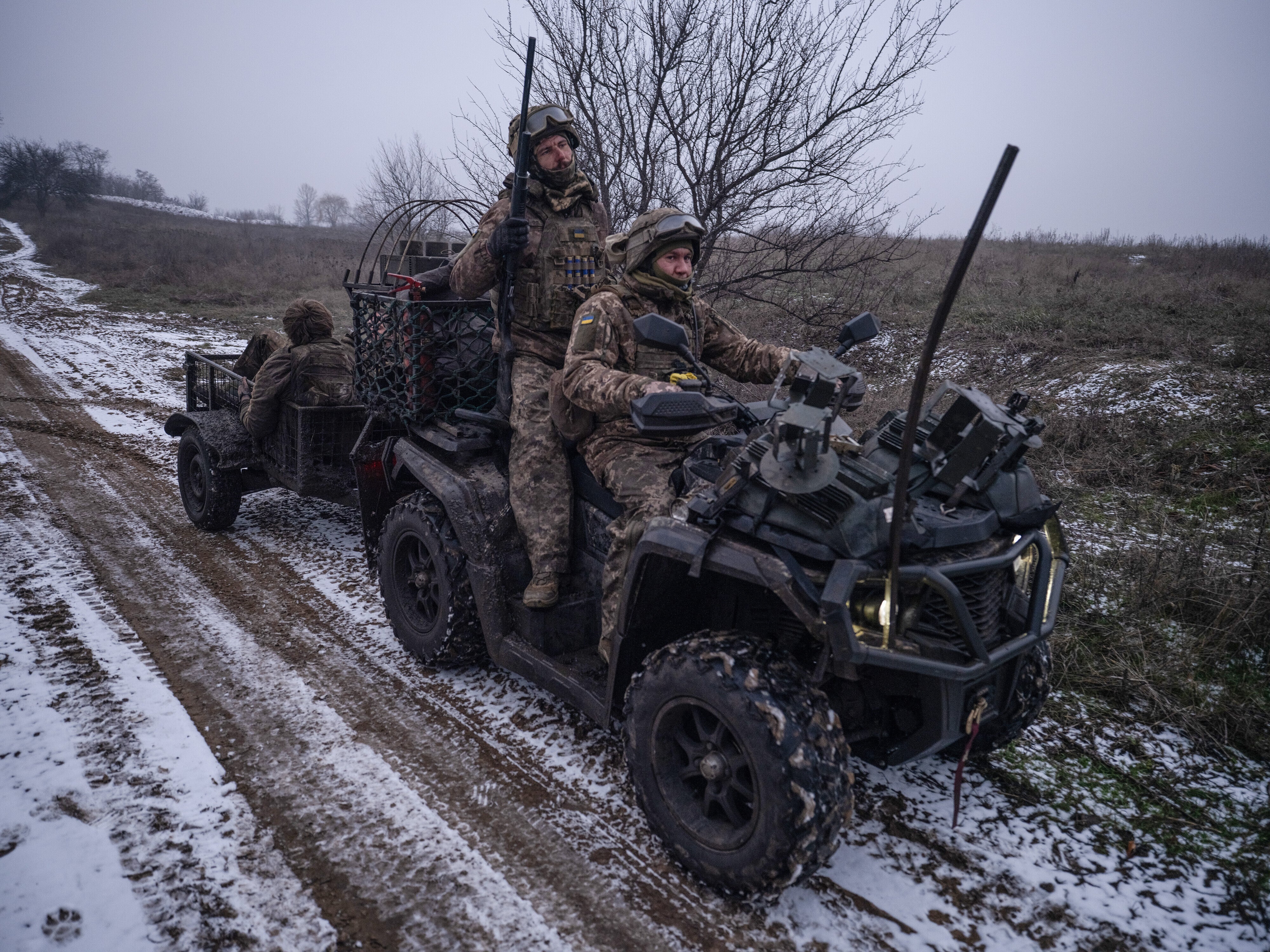 Soldiers ride a quad bike near Kostyantynivka, Donetsk region, Ukraine