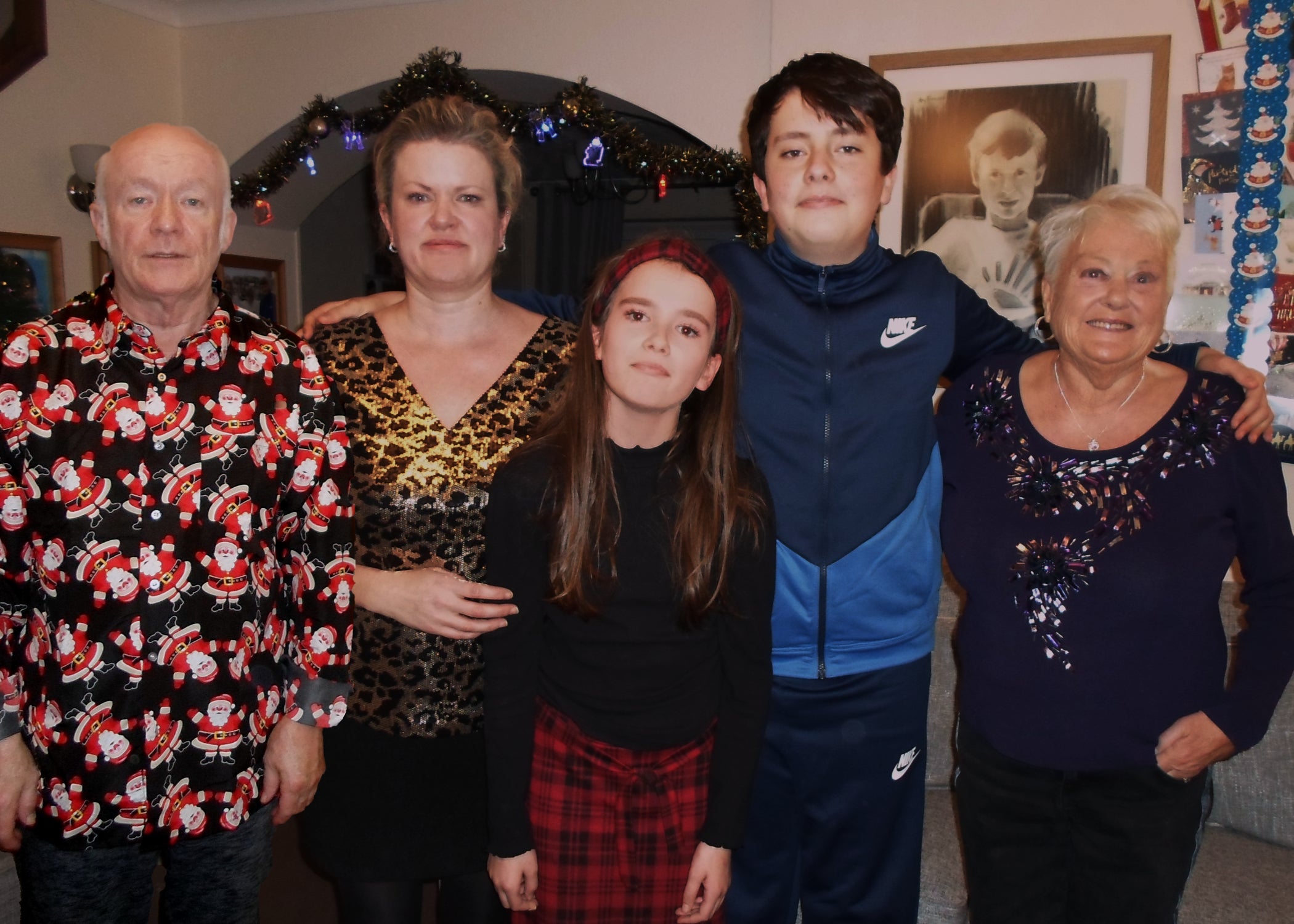 Mr Boxell pictured with, from left, his daughter Lindsey, grandchildren Abi and Alex, and wife Christine during Christmas 2020