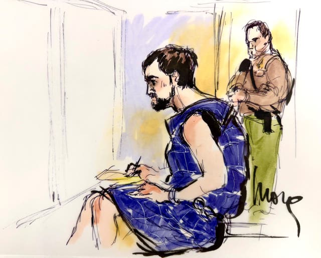 Nick Reiner, wearing a blue protective vest, makes his first court appearance
