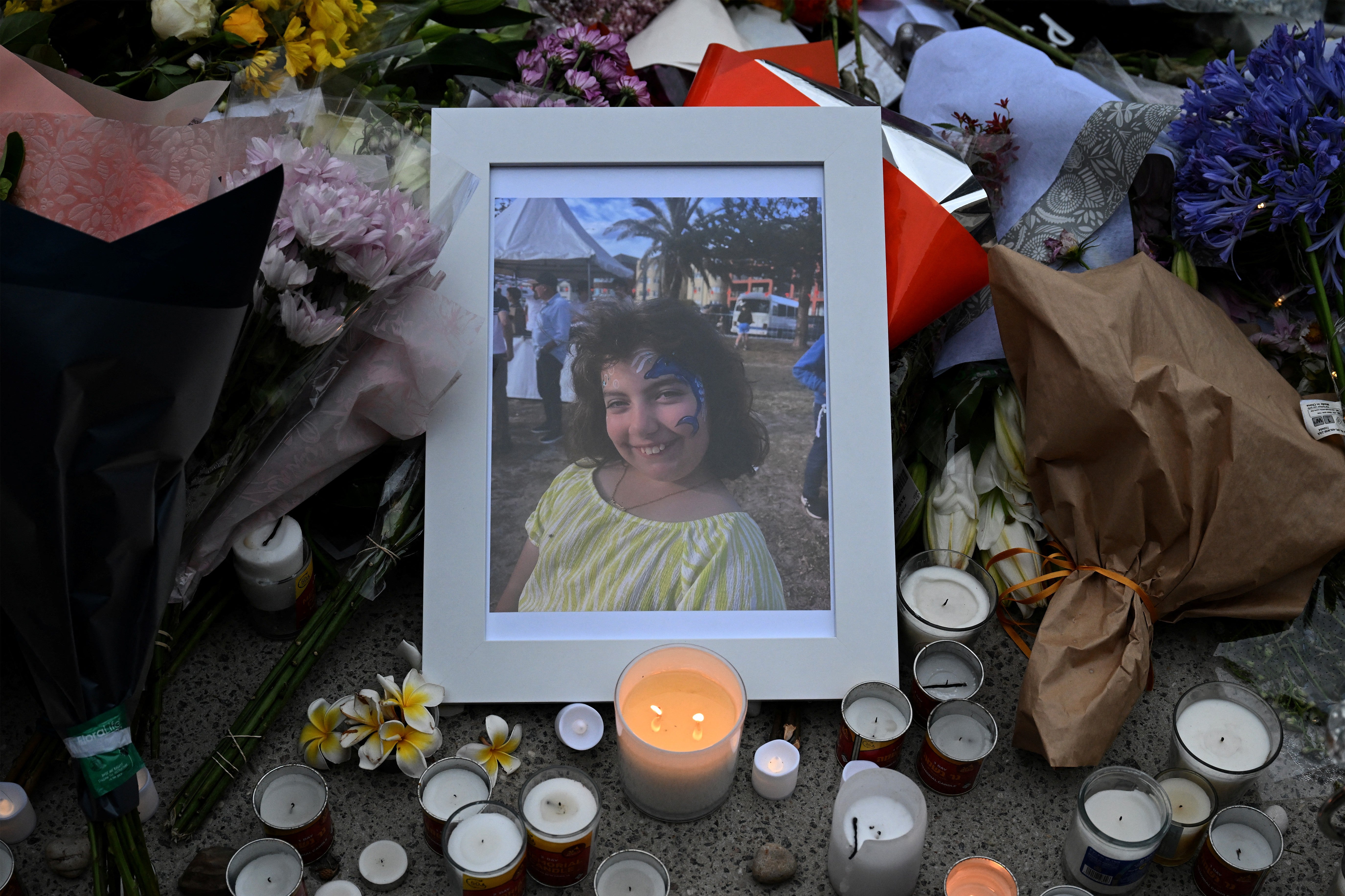 A portrait of 10-year-old Matilda, killed in the Bondi Beach shooting, is displayed during a vigil at Bondi Pavilion in Sydney on 16 December 2025