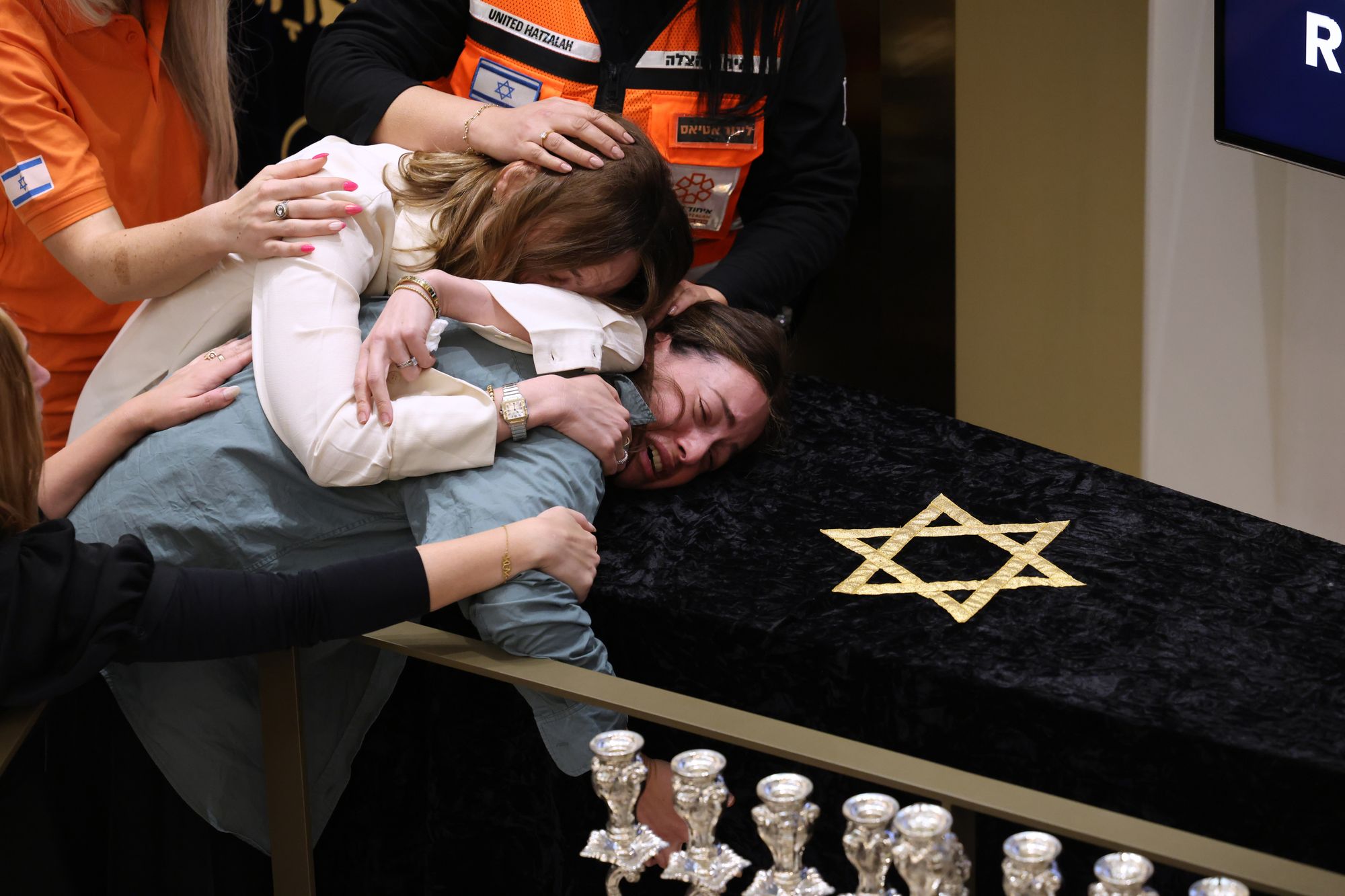 Mourners at the funeral of Rabbi Eli Schlanger