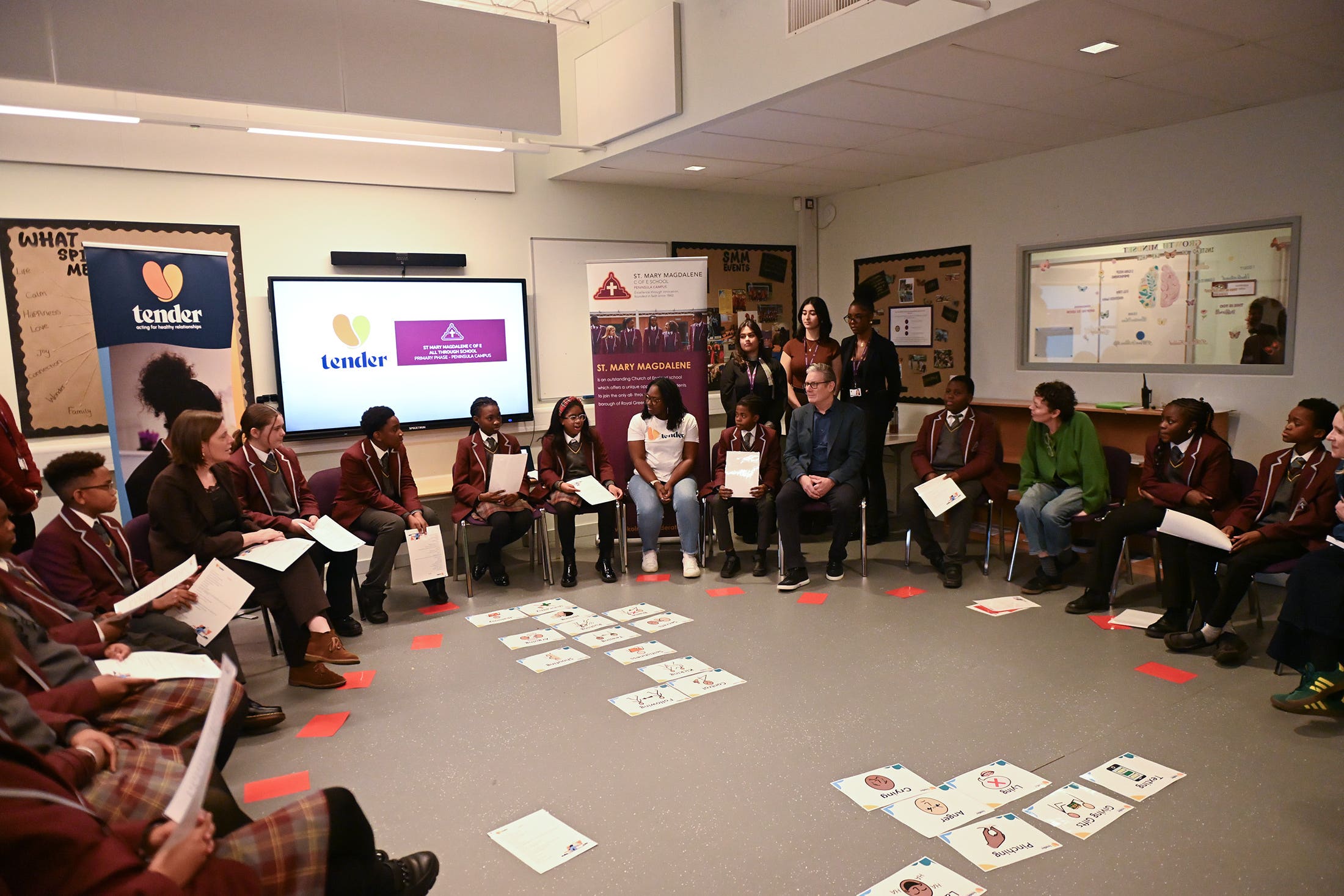 Sir Keir Starmer and Olivia Colman (fourth from right) during a visit to St Mary Magdalene school in London to meet with young people to discuss issues surrounding violence against women and girls (Eddie Mulholland/Daily Telegraph)