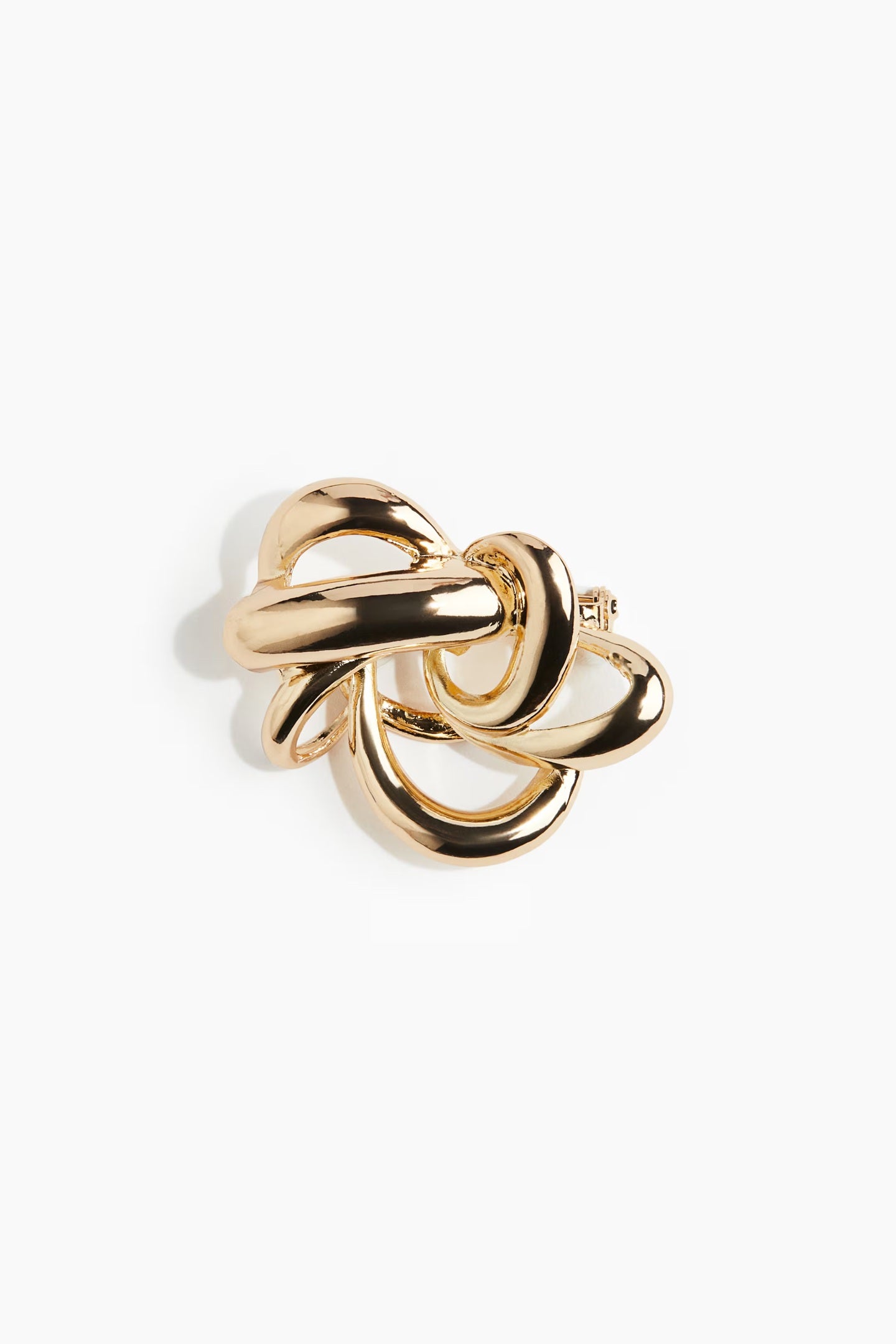 Gold swirl brooch