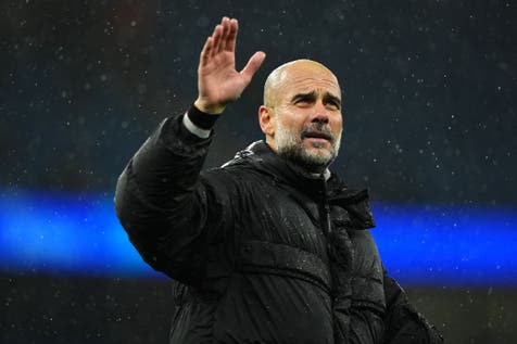 <p>Pep Guardiola says he is ‘happy’ at Man City (Martin Rickett/PA)</p>