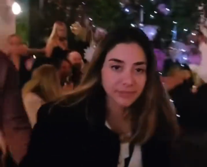 The woman in the video is seen seconds before lunging at the camera and assaulting a staff member at Hazie's restaurant in San Francisco
