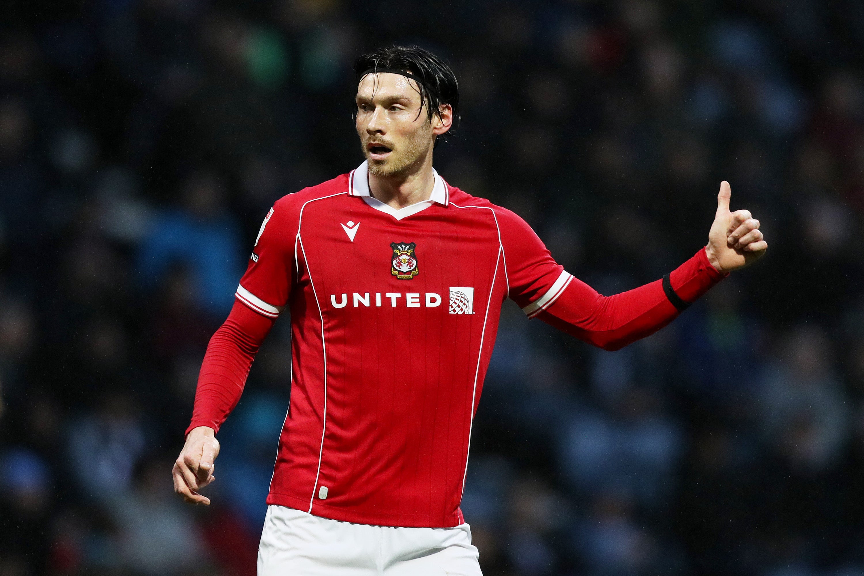 Kieffer Moore of Wrexham reacts against Preston North End