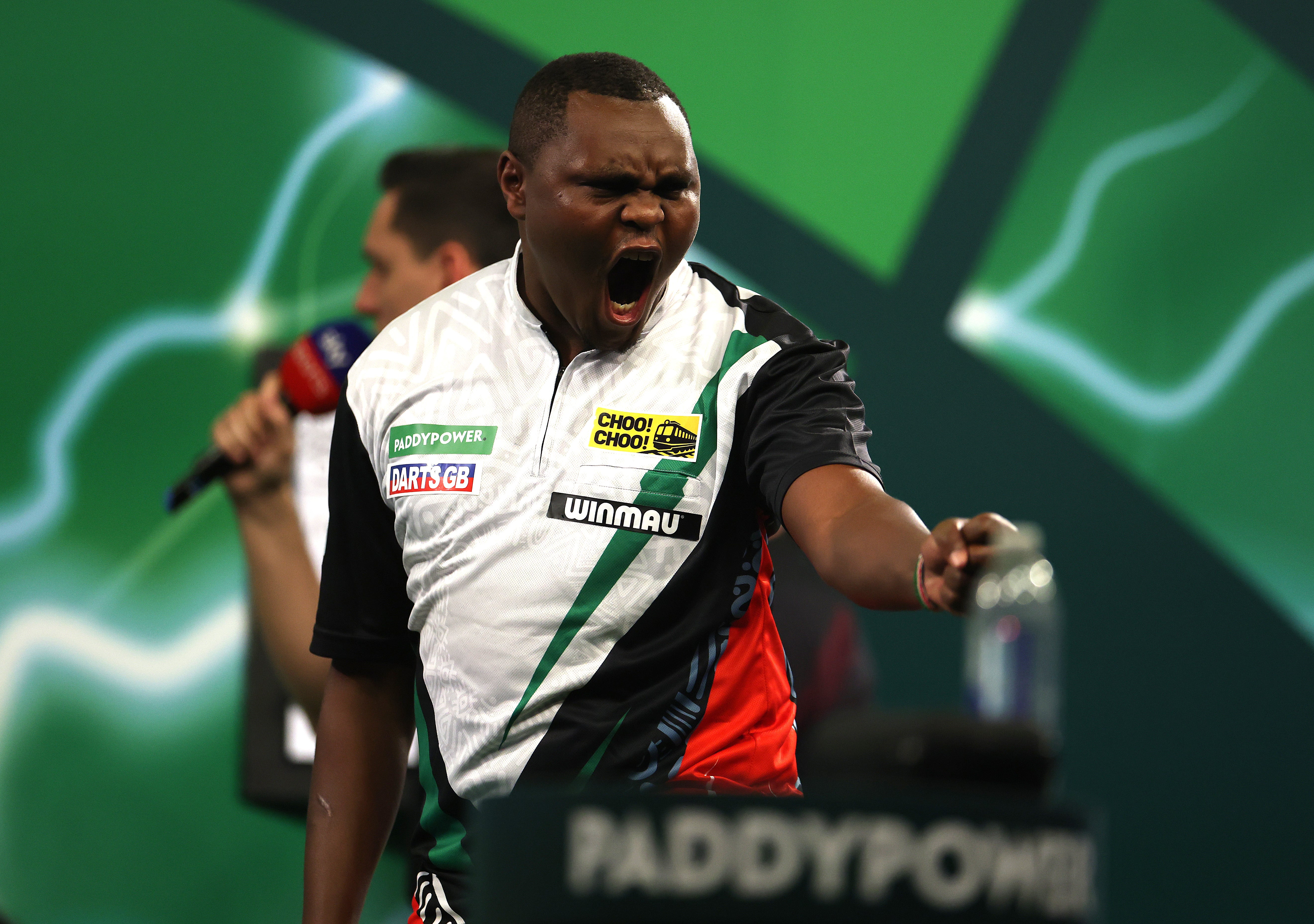 Kenyan vet David Munyua pulls off huge World Darts Championship shock