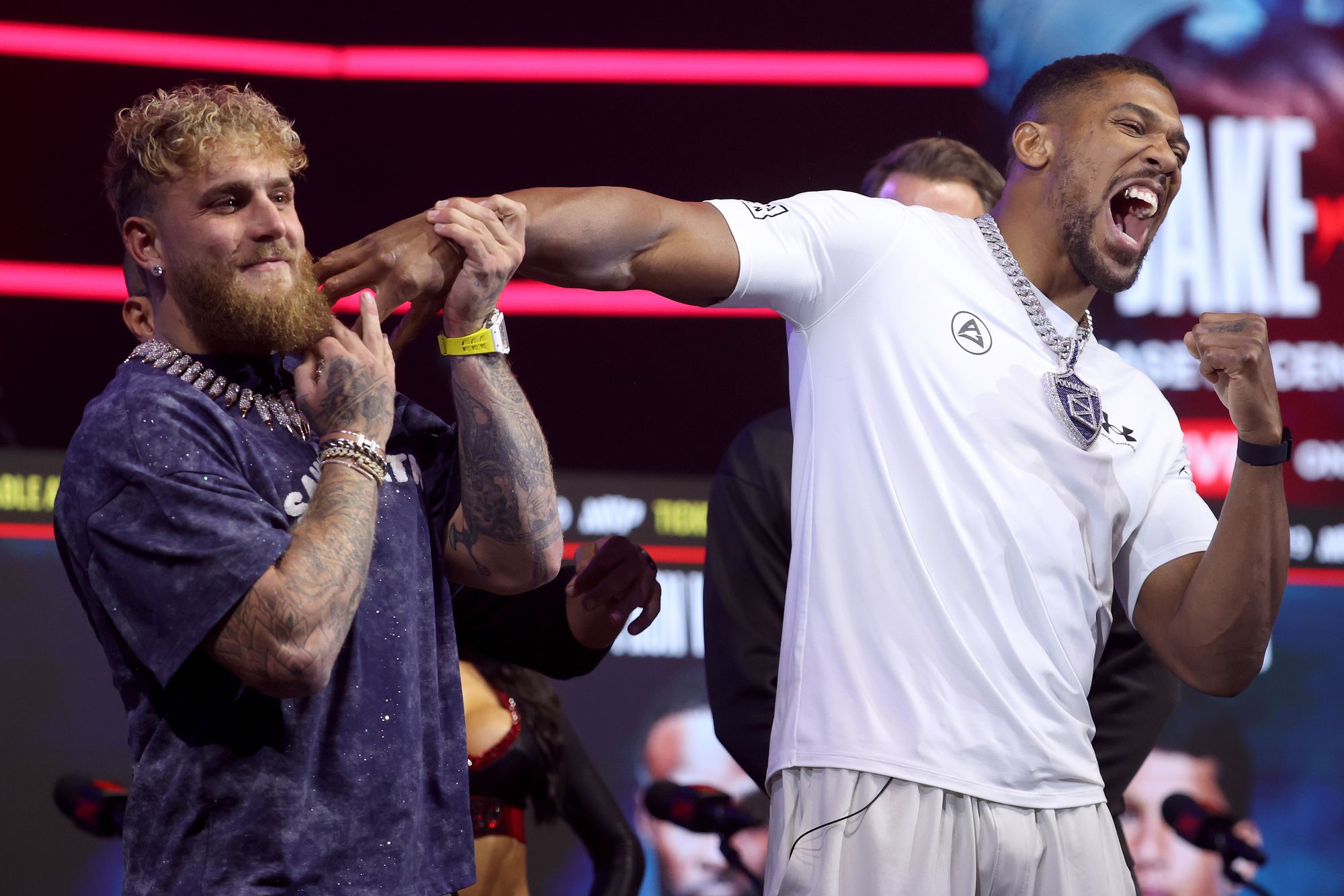 Joshua joking around with Paul at their final pre-fight press conference
