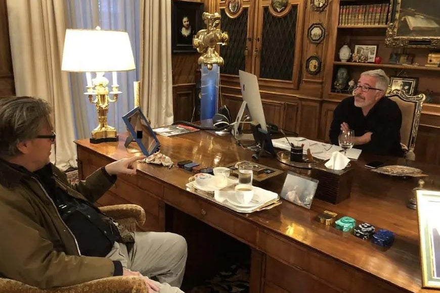 Jeffrey Epstein speaks with former Trump advisor Steve Bannon at Epstein's New York mansion, in this undated photo released by the House Oversight Committee on Dec. 18.