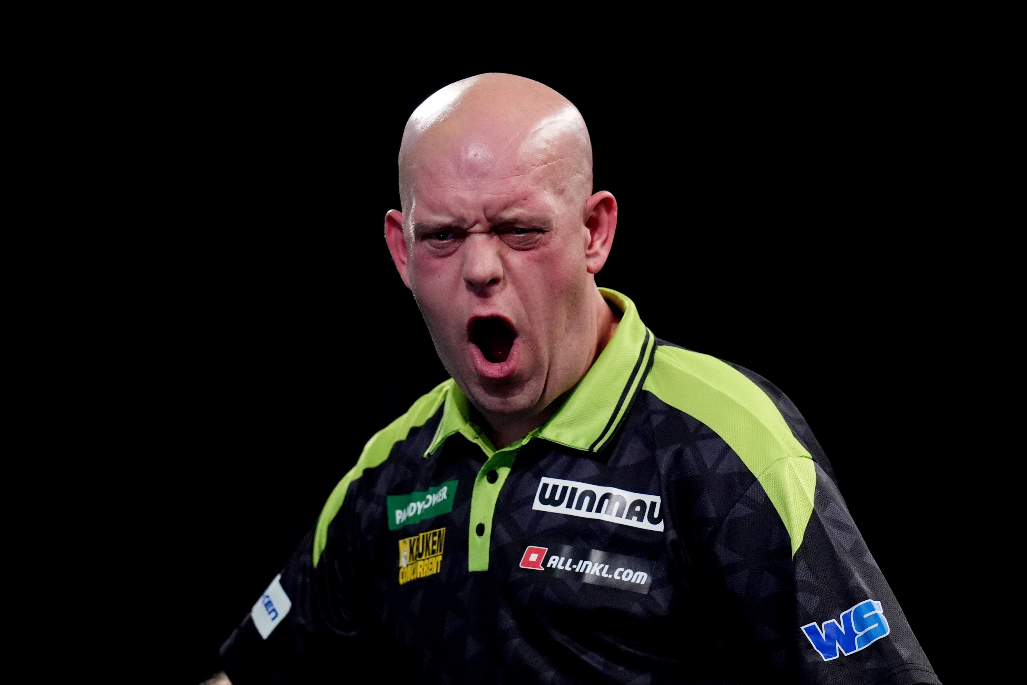 Michael van Gerwen survived a scare against Mitsuhiko Tatsunami (John Walton/PA)