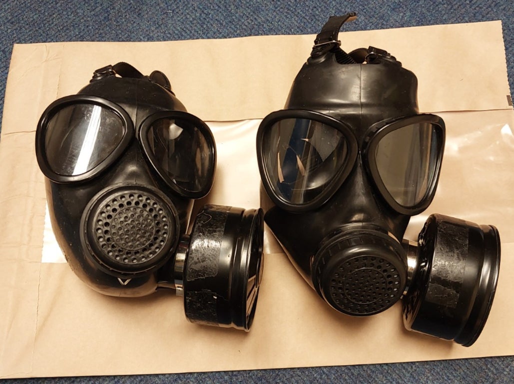 Gas masks worn by the intruders