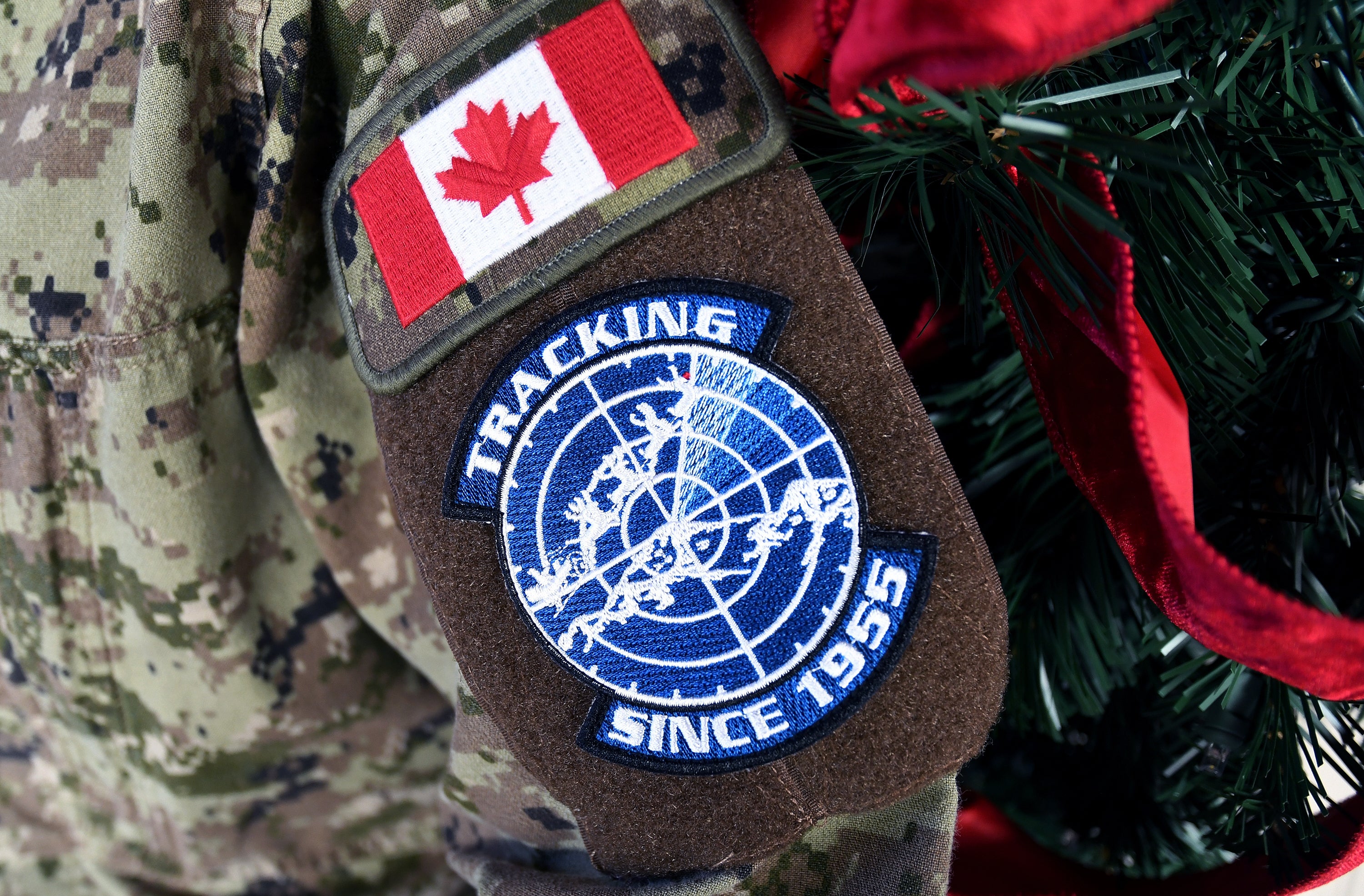 A patch representing the annual NORAD Tracks Santa Operation is seen on a military uniform sleeve at Peterson Space Force Base in Colorado Springs