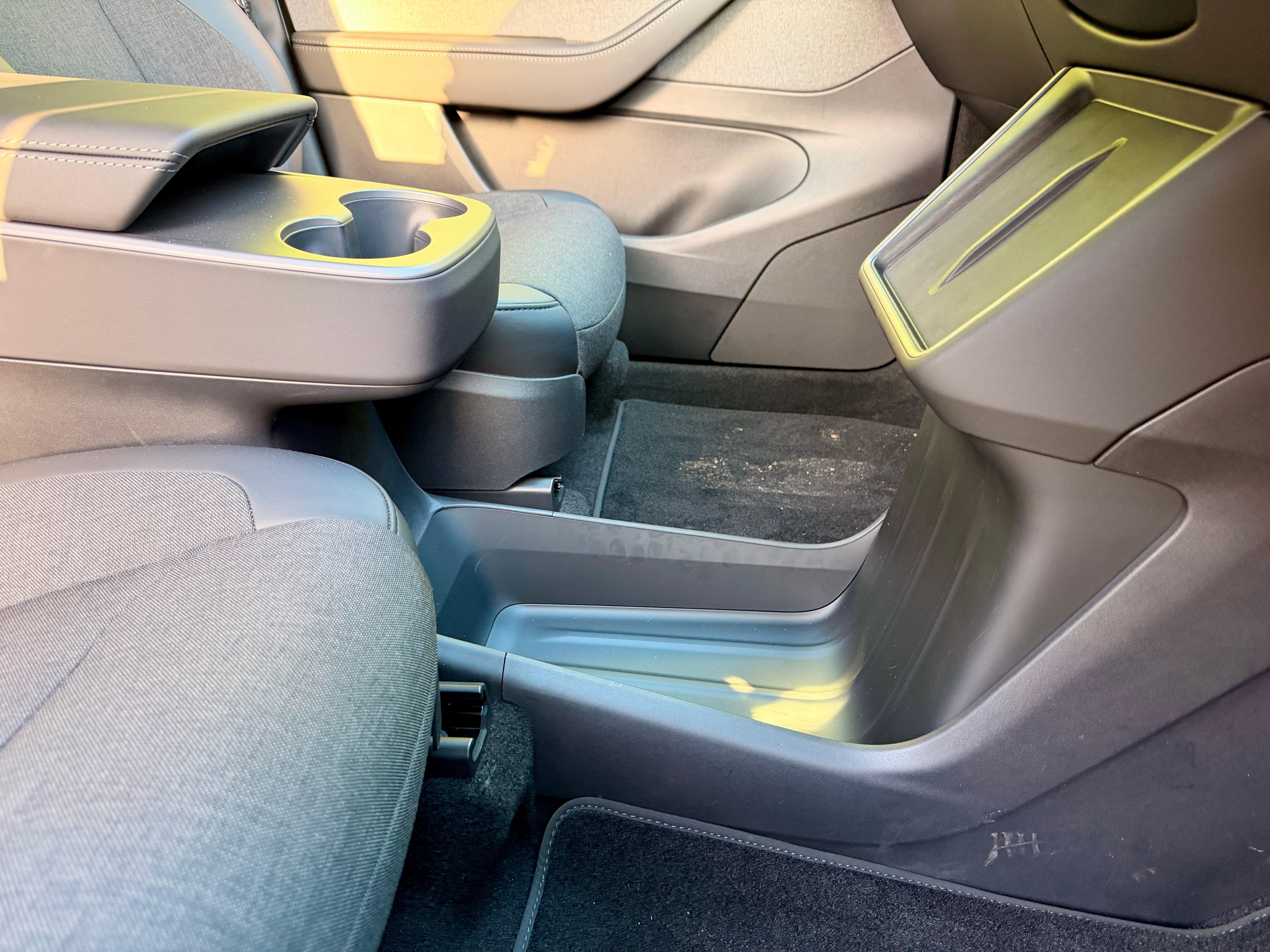 The Tesla Model Y Standard does without the lidded storage of other Model Y's but gets a useful tray for big bags