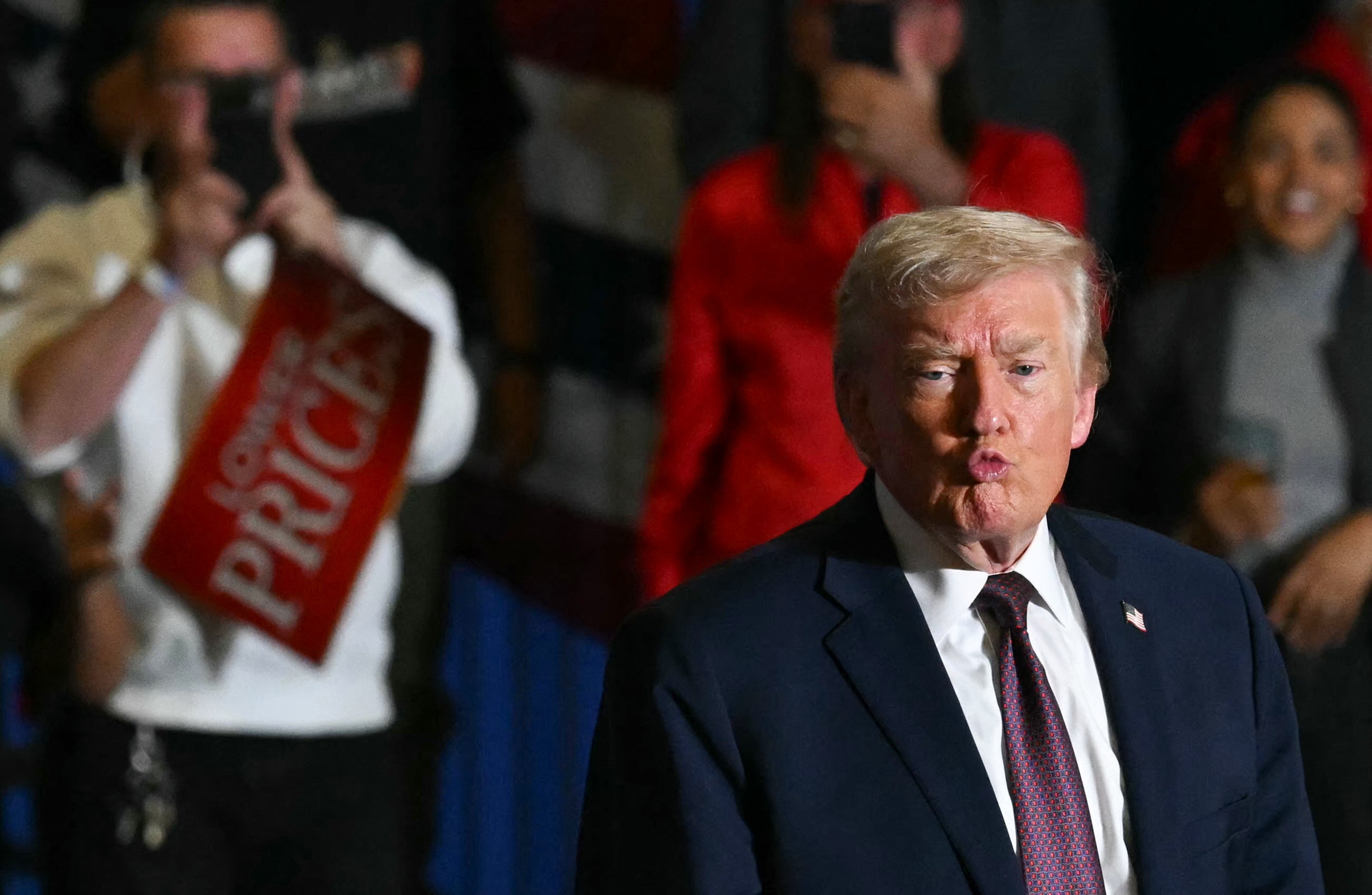 US President Donald Trump gestures to the crowd after speaking at a political rally in Rocky Mount, North Carolina on December 19, 2025