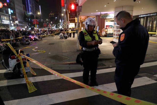 <p>Taiwan police cordoned off the scene after a knife attack</p>