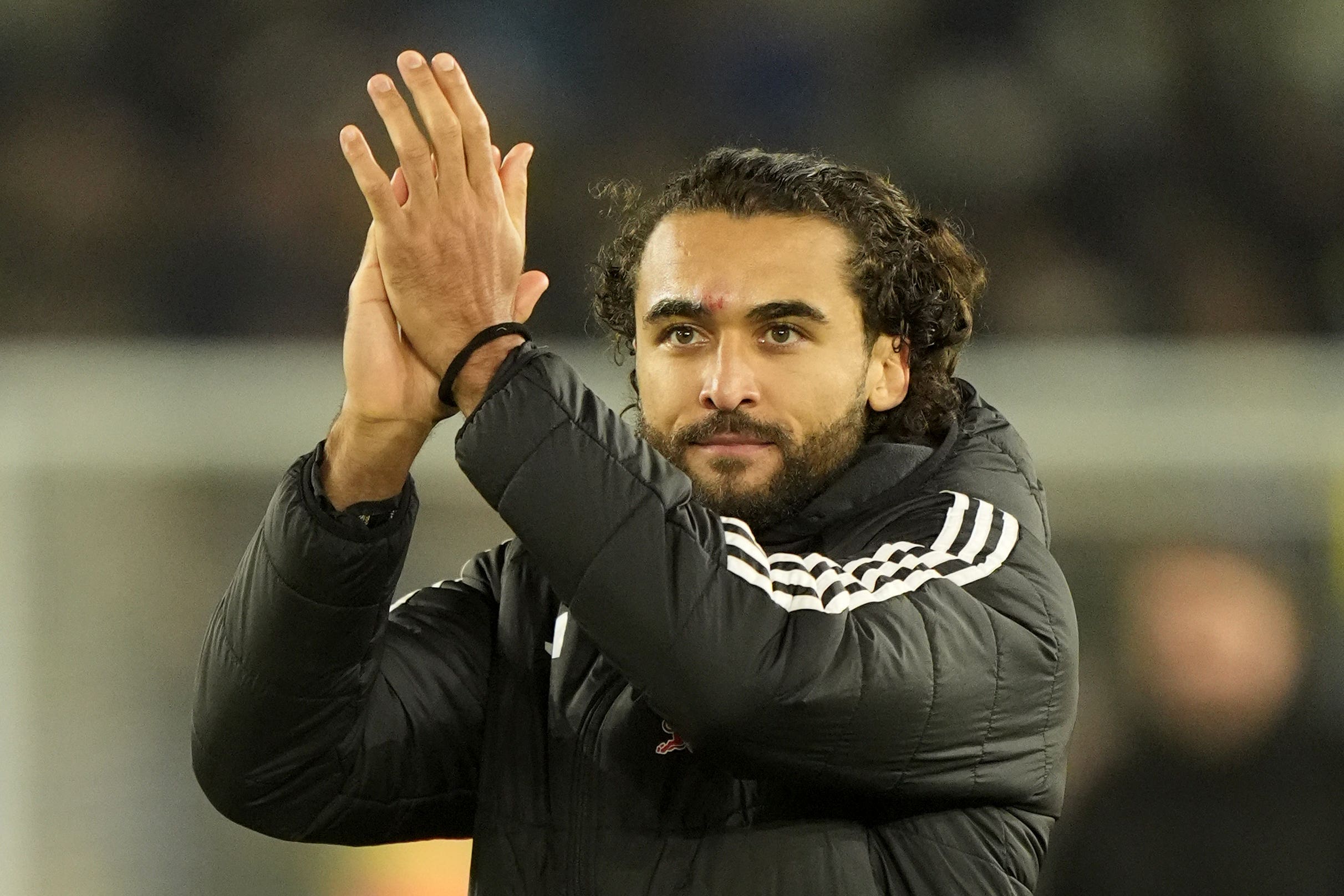 Dominic Calvert-Lewin applauds Leeds fans after his brace (Danny Lawson/PA)