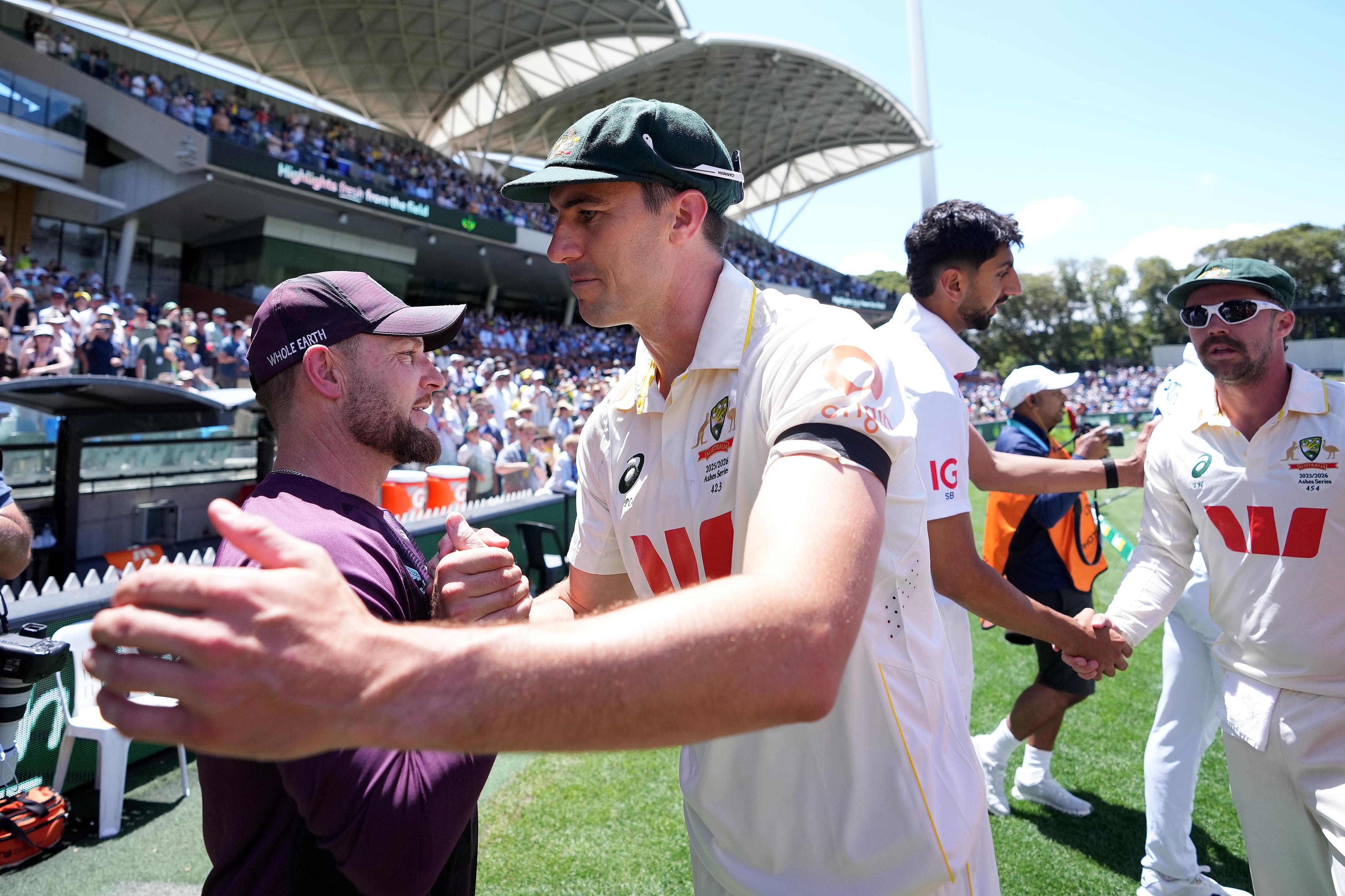Australia’s Pat Cummins shakes hands with McCullum after the conclusion of the third Test in Adelaide