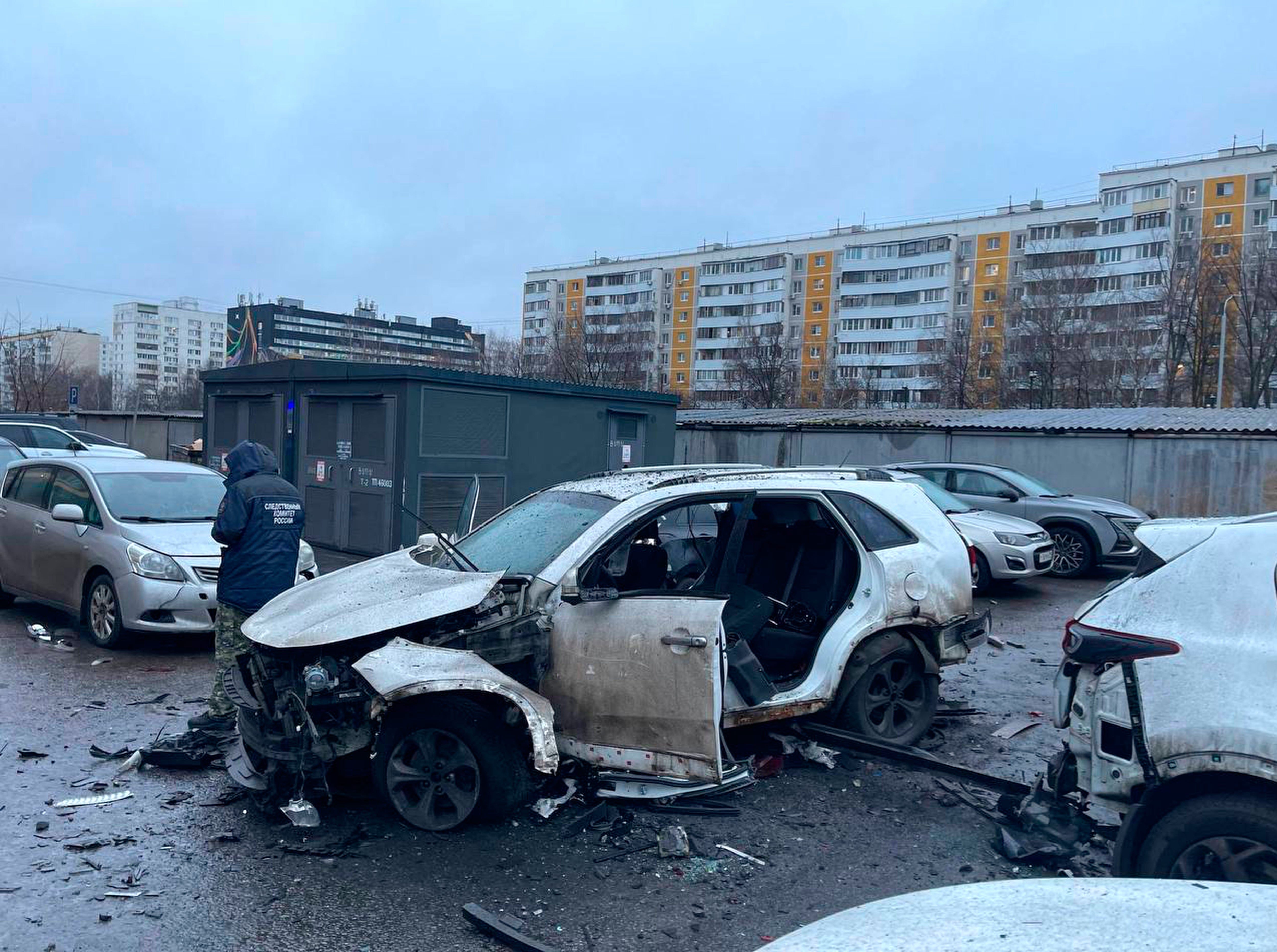 <p>An investigator working at the scene where Lt. Gen. Fanil Sarvarov, head of the Operational Training Directorate of the Russian Armed Forces General Staff, was killed by an explosive device placed under his car in Moscow </p>