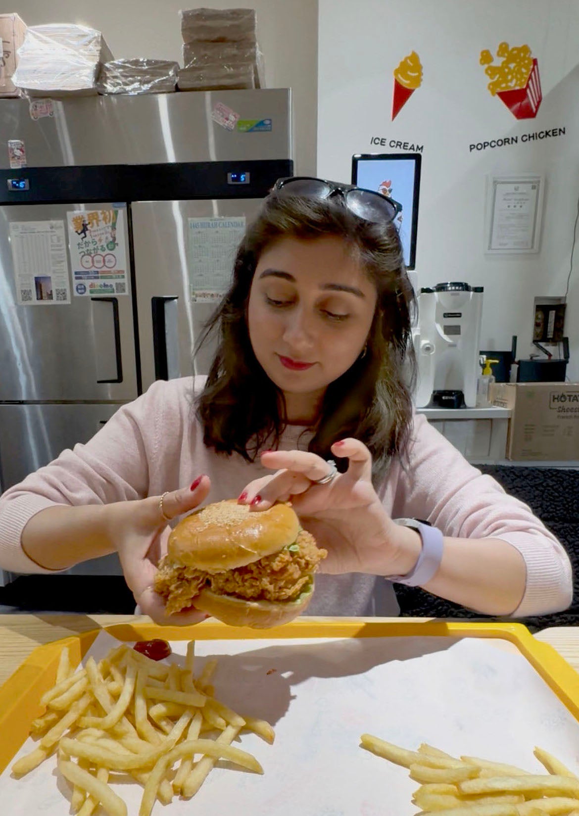 Queenie tucks into her Christmas fried chicken at Halal Master Chicken in Takadanobaba