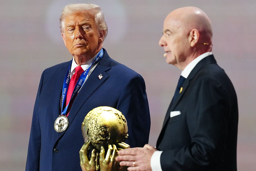 US president Donald Trump receives the Fifa Peace Prize from Gianni Infantino