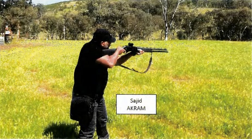 Sajid Akram appears to conduct firearms training in a countryside location, suspected to be in NSW