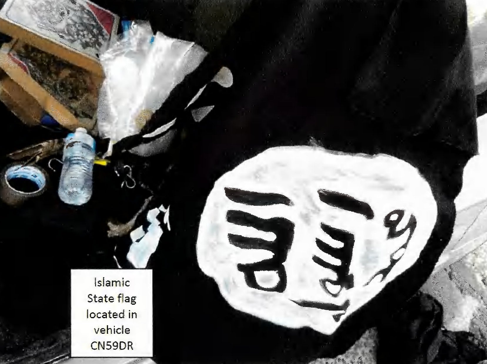 One of two homemade Isis flags found in the vehicle used by the Akrams