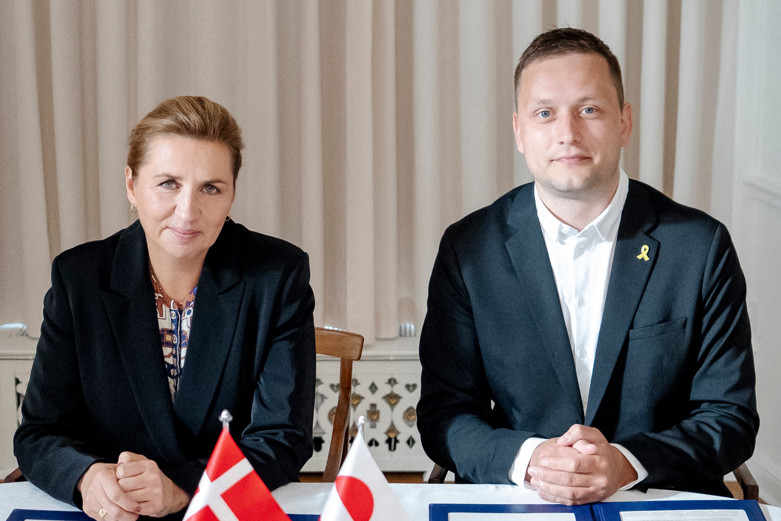 Denmark's Prime Minister Mette Frederiksen and Greenland's government leader Jens Frederik Nielsen