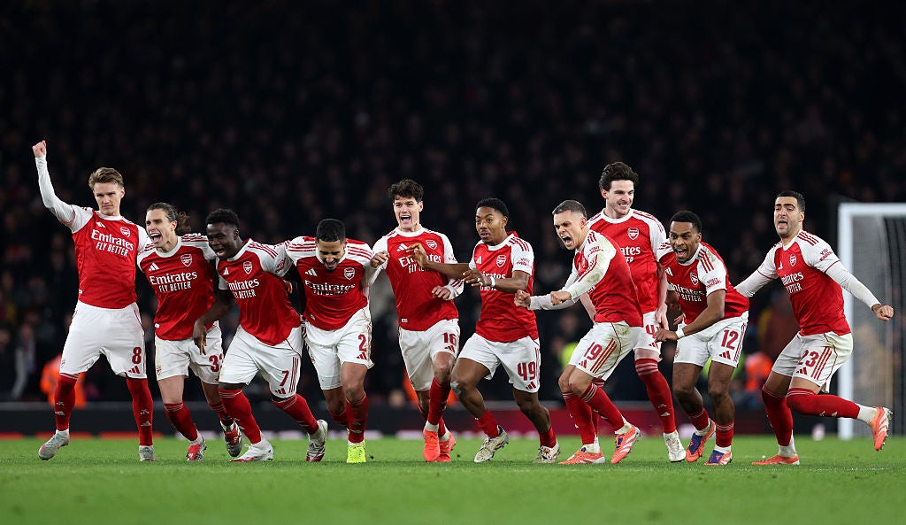 <p>Arsenal celebrate as the spot-kick is saved for victory</p>
