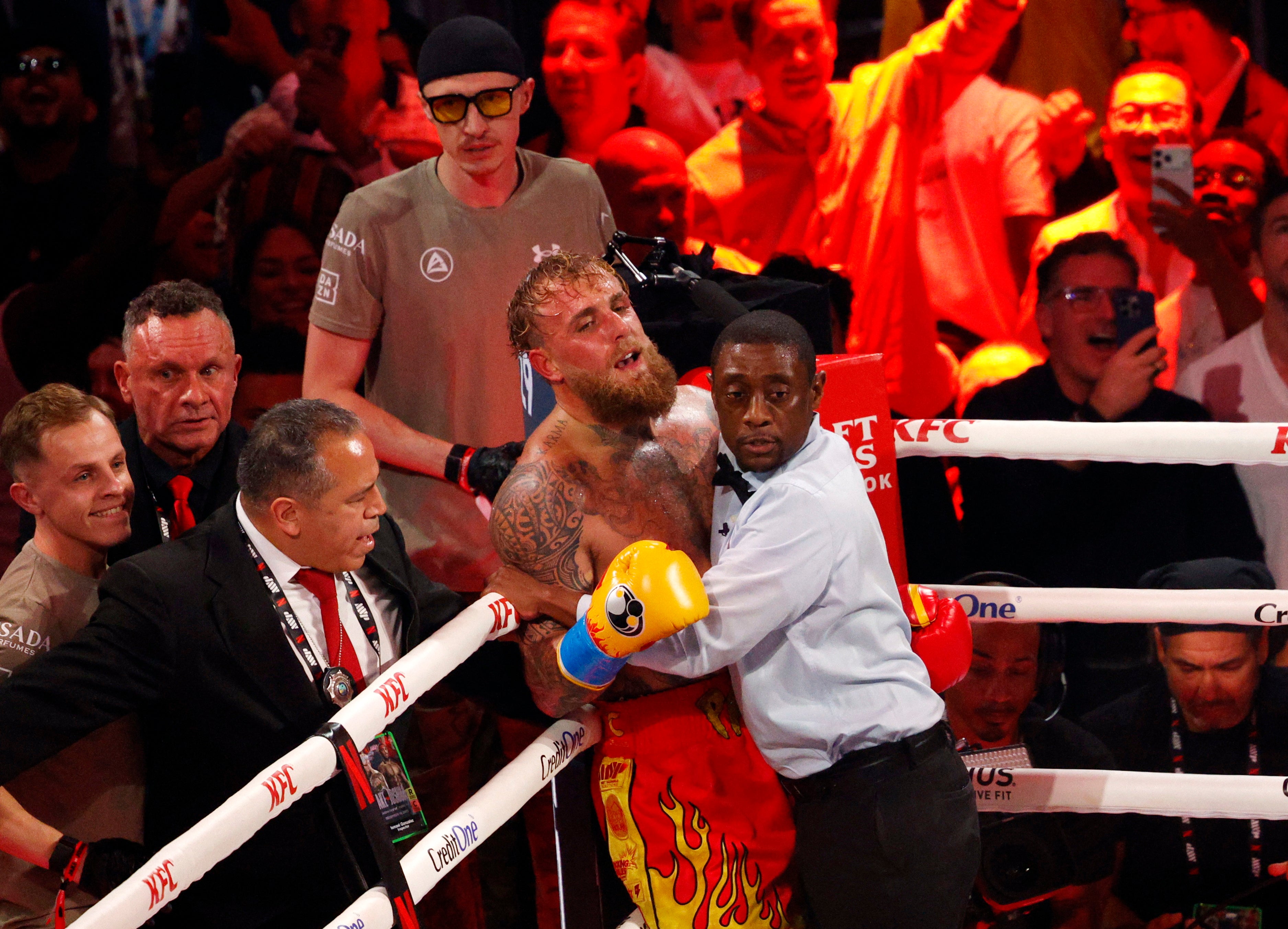 <p>Jake Paul reacts after defeat against Anthony Joshua</p>