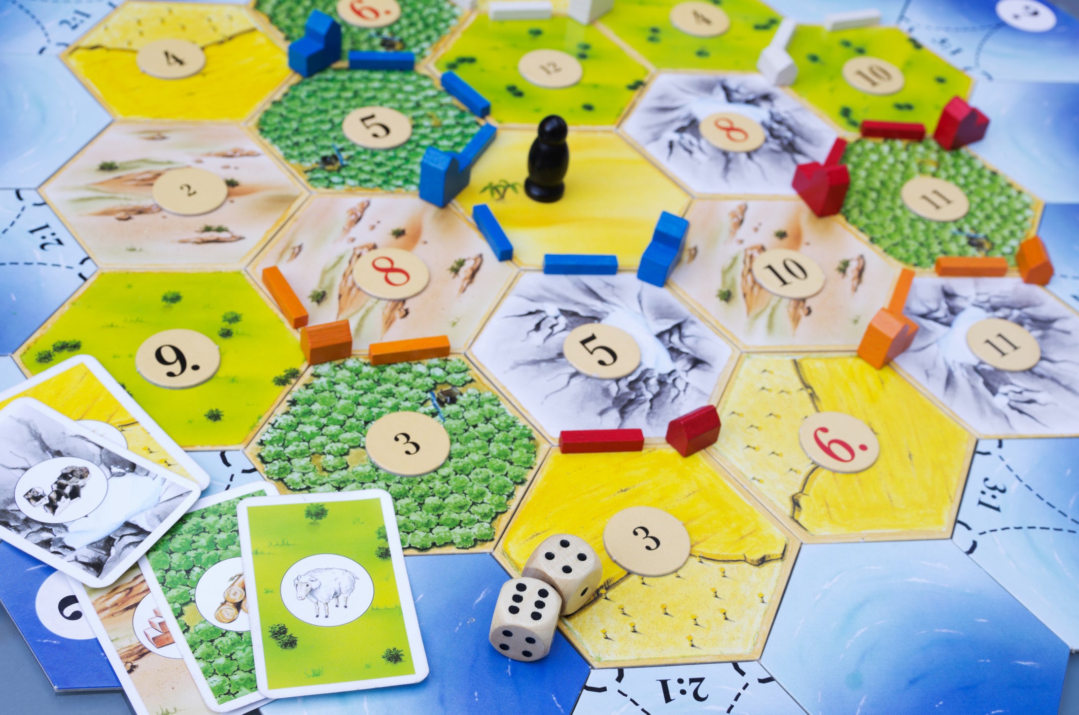 Settlers of Catan is a strategy board game for three to four players