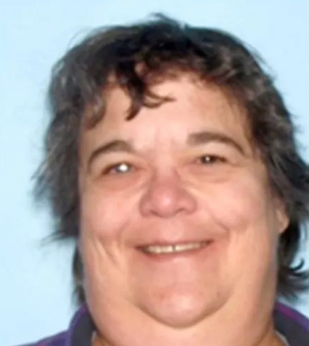 Authorities said Slavin (pictured) and Abbott were arrested after investigators found 13 plastic bags containing dead dogs stored inside three refrigerators at their Georgia home