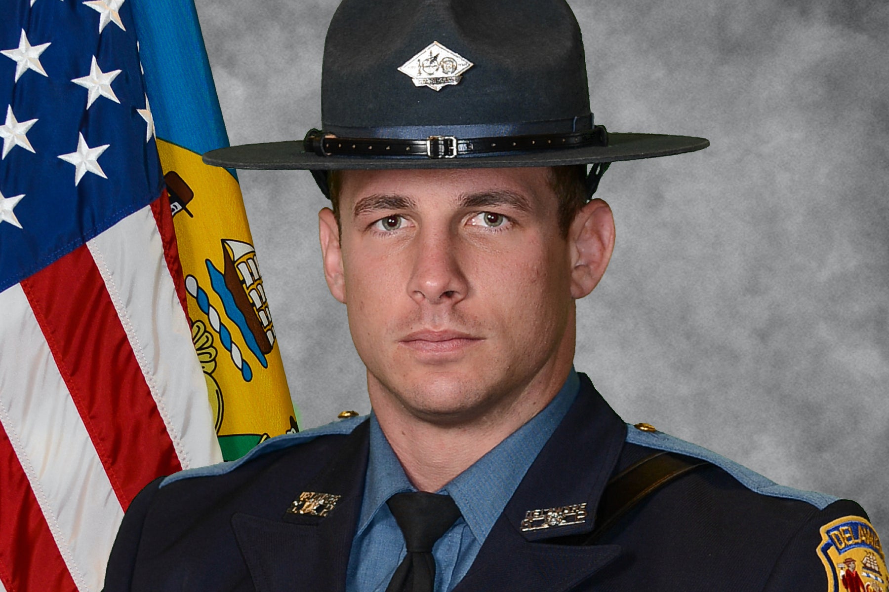 <p>This photo provided by the Delaware State Police in December 2025 shows Cpl. Matthew Snook, a state trooper who was fatally shot at a DMV office near Wilmington, Del. (Delaware State Police via AP)</p>