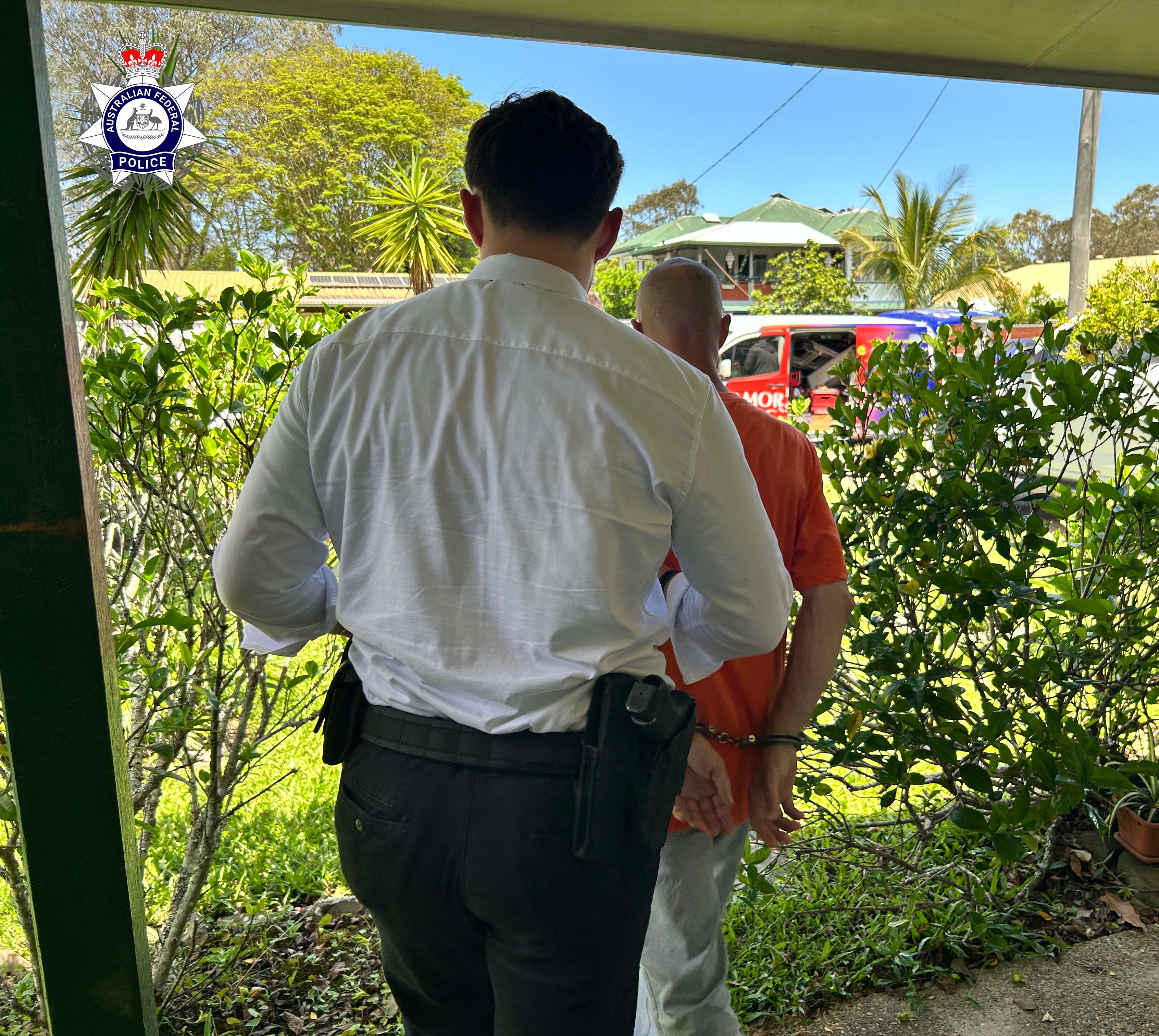 <p>Australian Federal Police has charged a 43-year-old British man in Queensland over the alleged display of Nazi symbol</p>