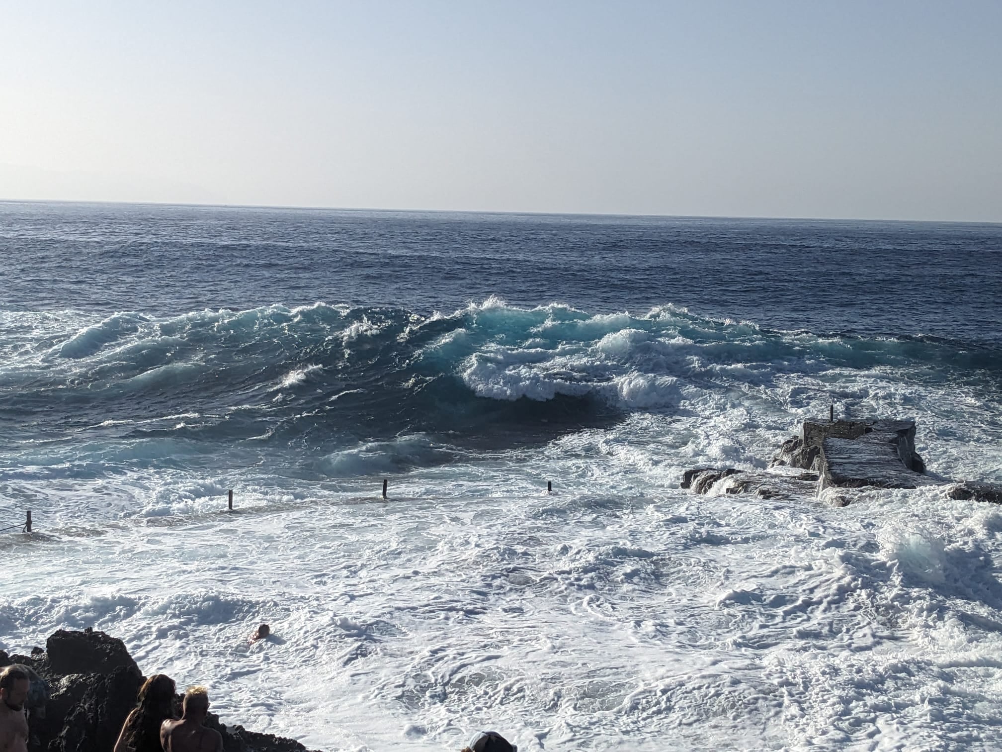 A natural pool in Los Gigantes being hit by large waves on December 7