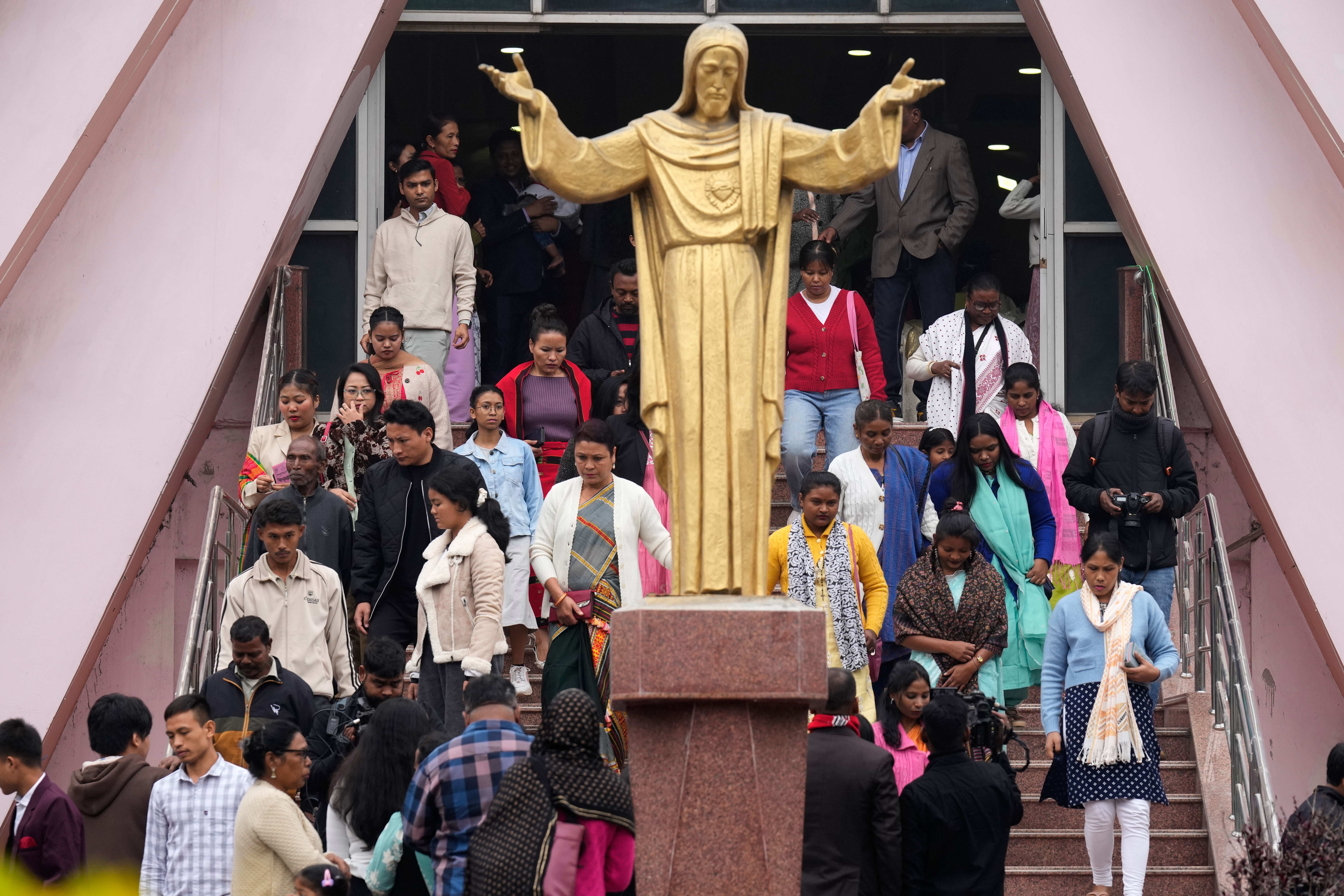 Christians leave a church after Christmas prayers in Guwahati, India